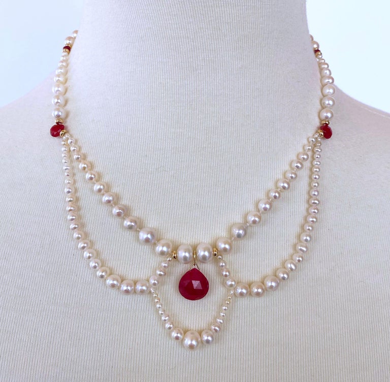 Gorgeous hand made Victorian inspired necklace by Marina J. This beautiful and classic piece is made of Graduated Pearl Strands, which have been individually picked for a perfect and harmonious taper. The Lace like draping frame the a radiant