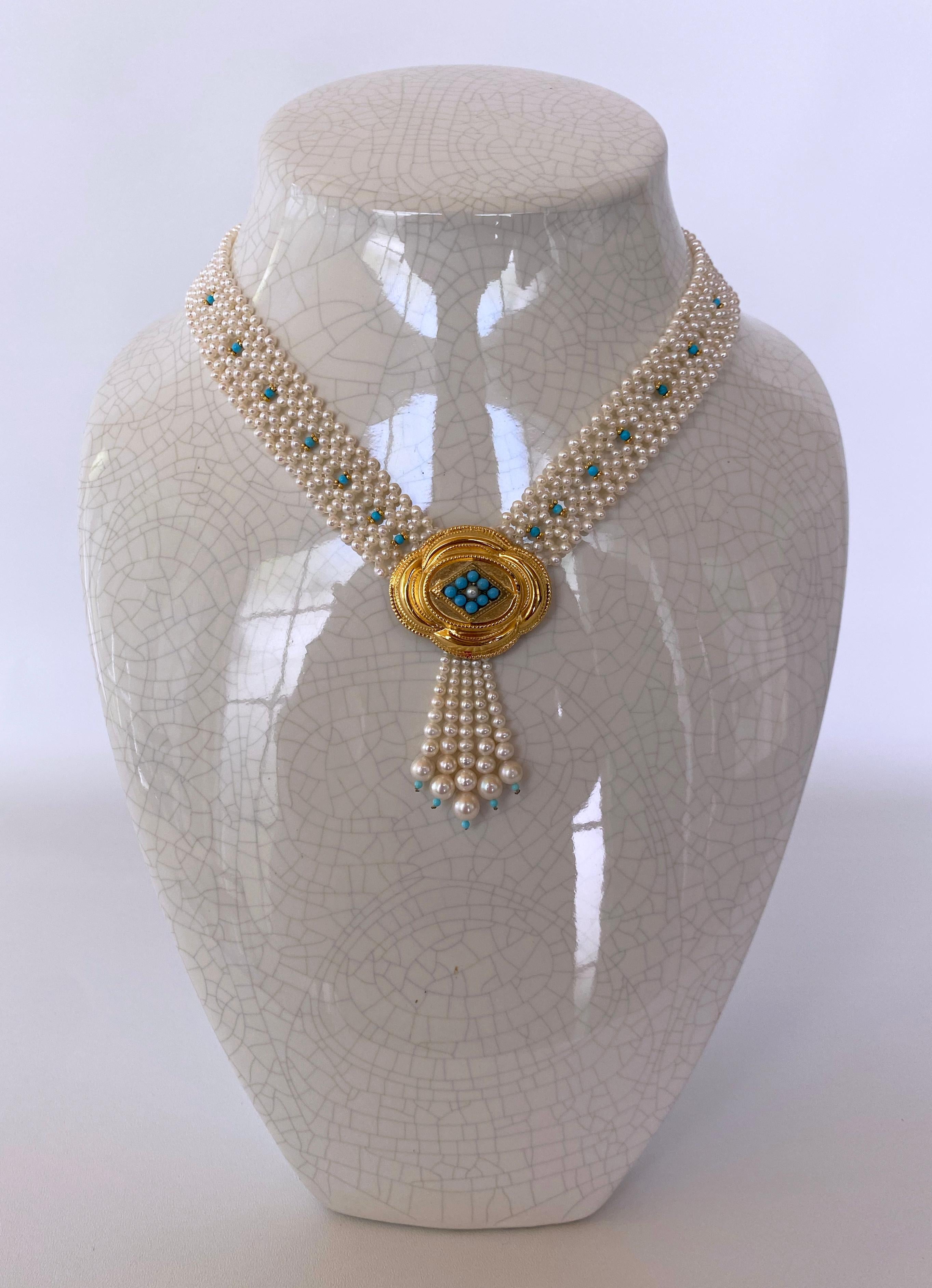 Gorgeous piece made in Los Angeles by Marina J. This lovely Victorian inspired Necklace is hand woven into a tight lace like design, using all Cultured White Pearls displaying beautiful sheen and iridescence. Small Turquoise and 14k Yellow Gold