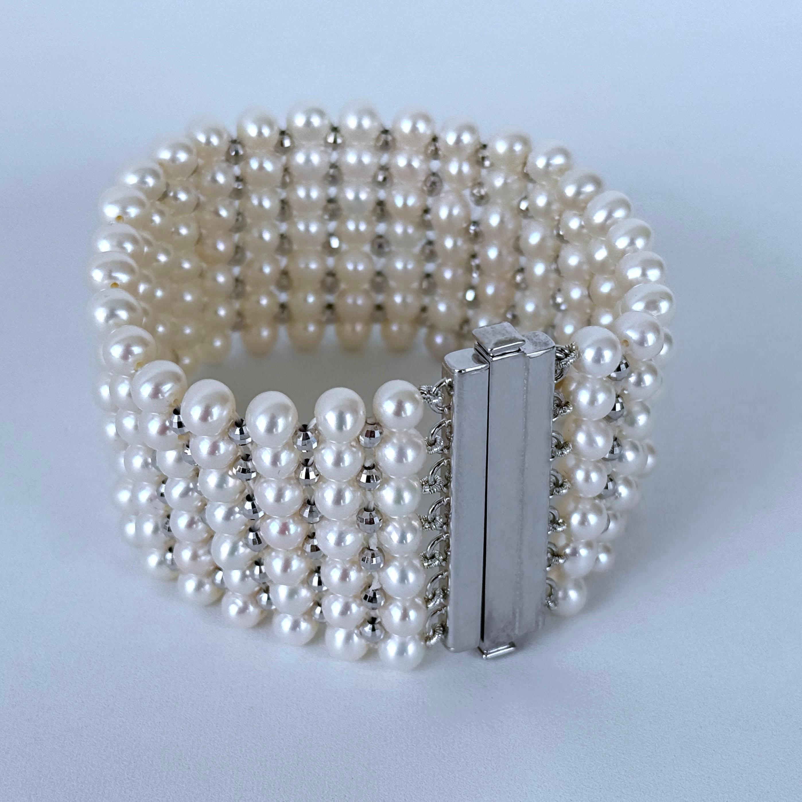 Gorgeous and Regal Bracelet by Marina J.

This bracelet is woven into a tight lace design featuring all smooth round Pearls and Faceted Silver - Rhodium plated 