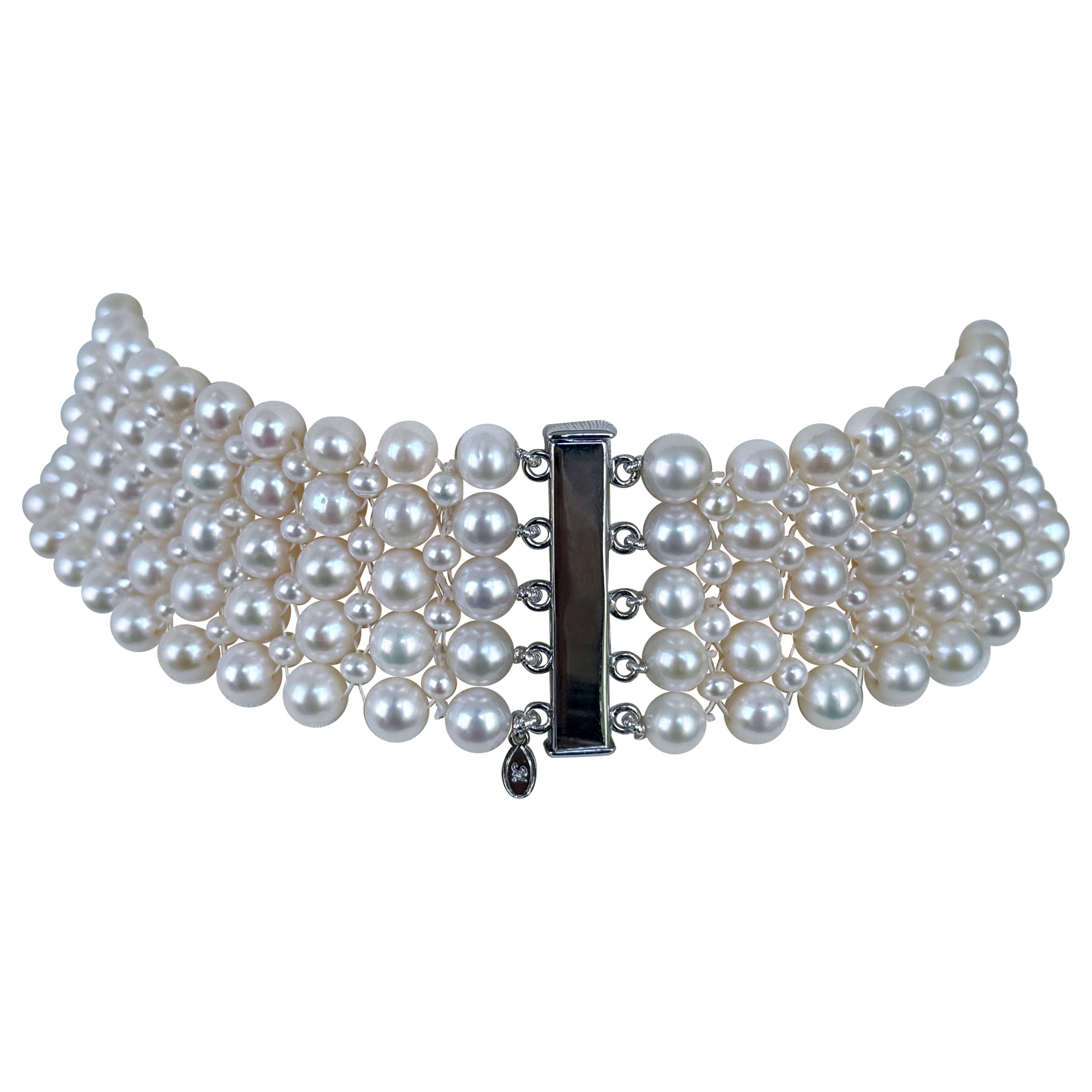 Magnifique tour de cou de Marina J.

Cette pièce est composée de perles et de perles de rocaille tissées ensemble en un motif serré de type colonne. Une pièce étonnante et royale. Ce tour de cou est tissé avec une légère graduation, ce qui lui