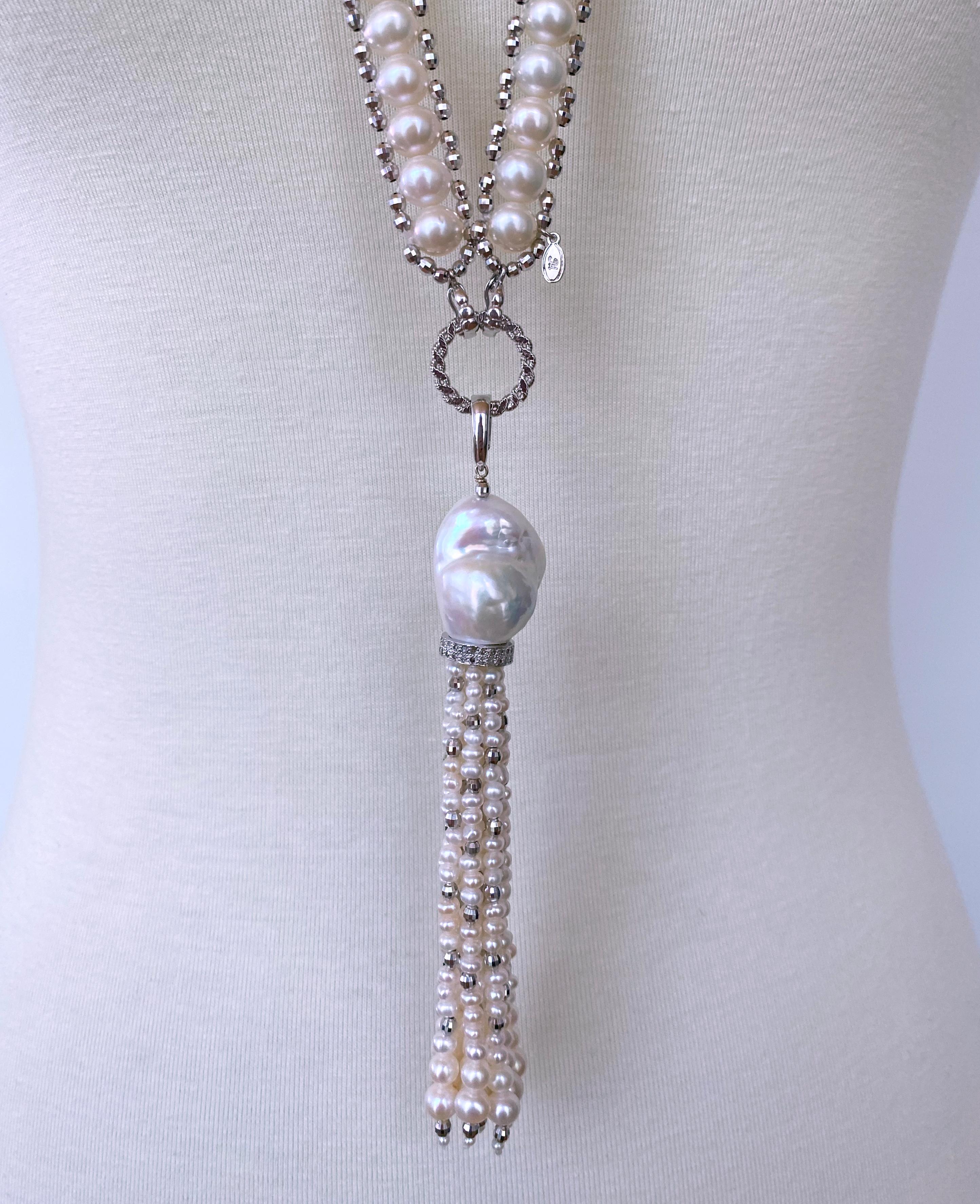 Amazing piece by Marina J. This striking Sautoir is made using all cultured white Pearls and adorned in gleaming faceted Rhodium Plated - Silver beads and detailing. Each Silver bead has multiple facets on them, giving an almost Disco Ball like