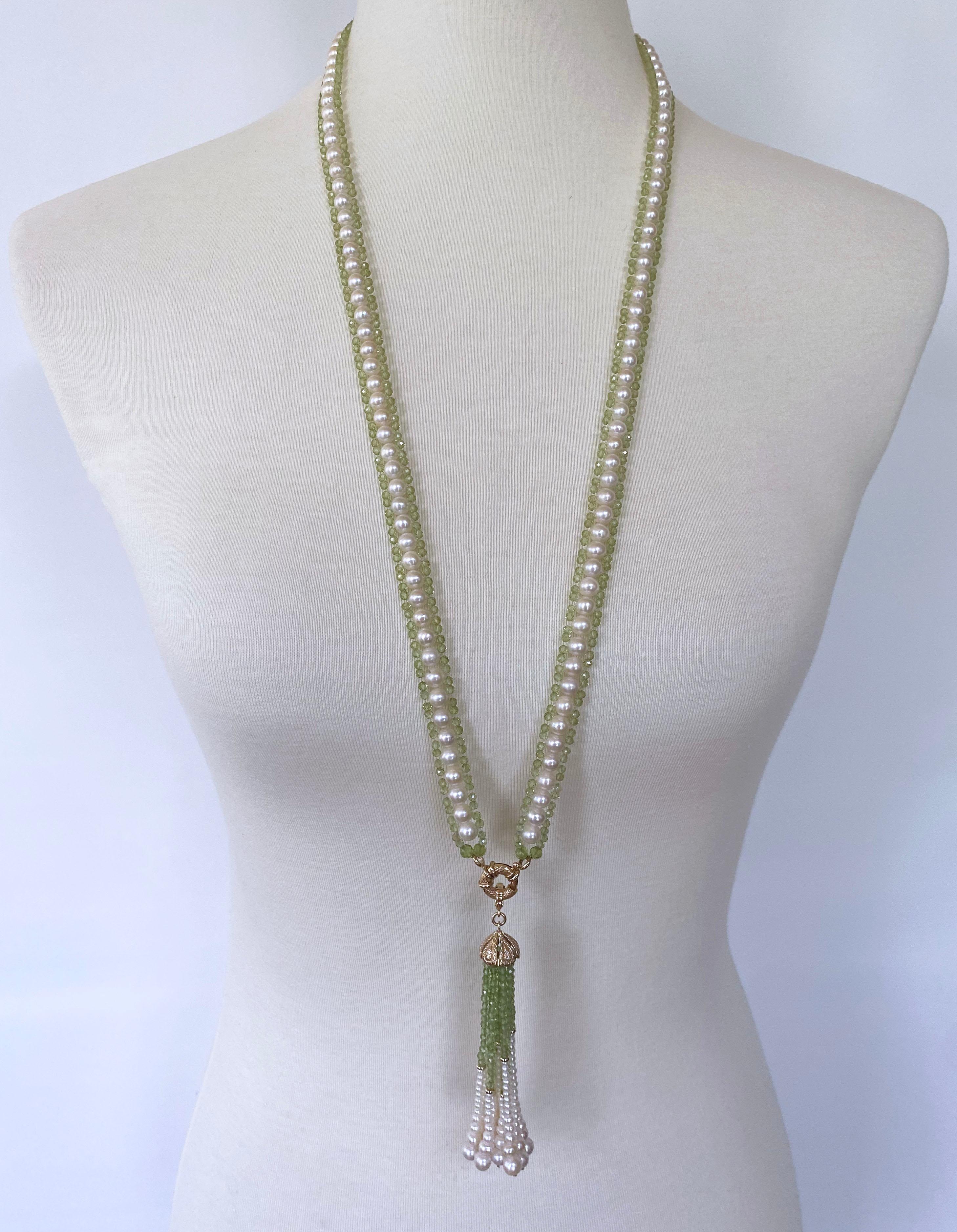 Beautiful piece by Marina J. This piece was created using all Cultured White Pearls woven together with gorgeous Faceted Peridot beads. The Peridot beads display a vibrant Spring Green color whose translucency radiates when hit with light. Measuring