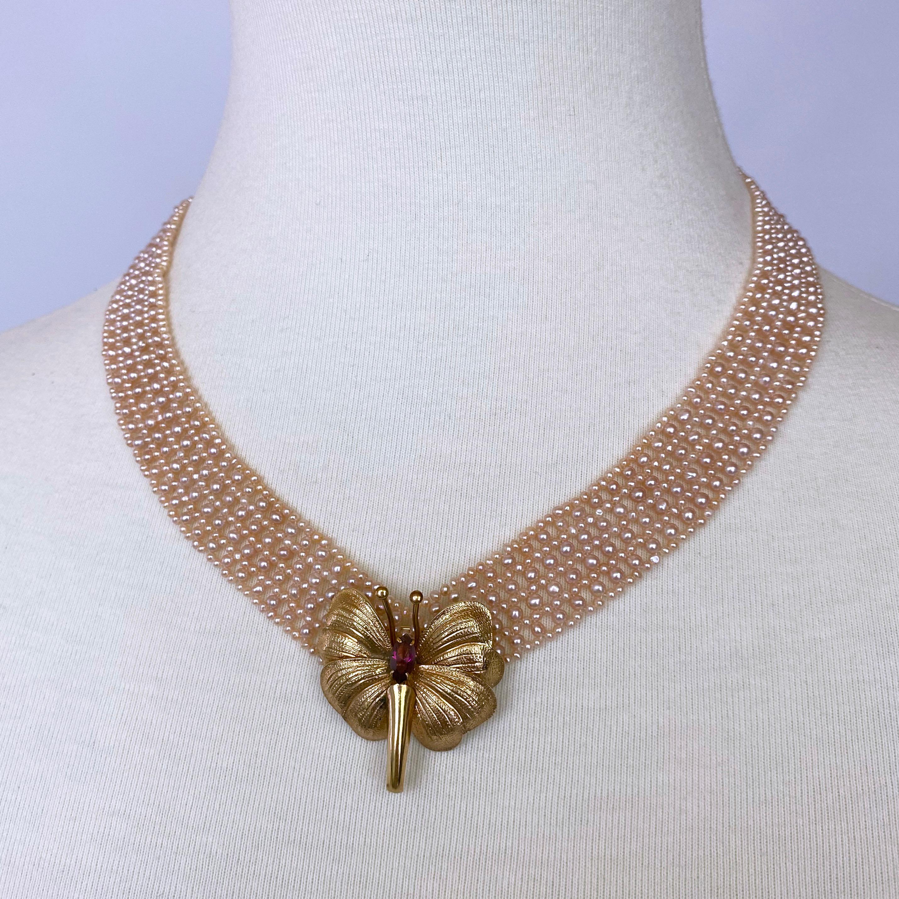 Gorgeous necklace by Marina J. This lovely piece is made using all cream colored Pink Pearls intricately woven together into a fine lace like design. This necklace displays multi sized Pearl columns woven into a dramatic 'V' shaped Necklace, perfect