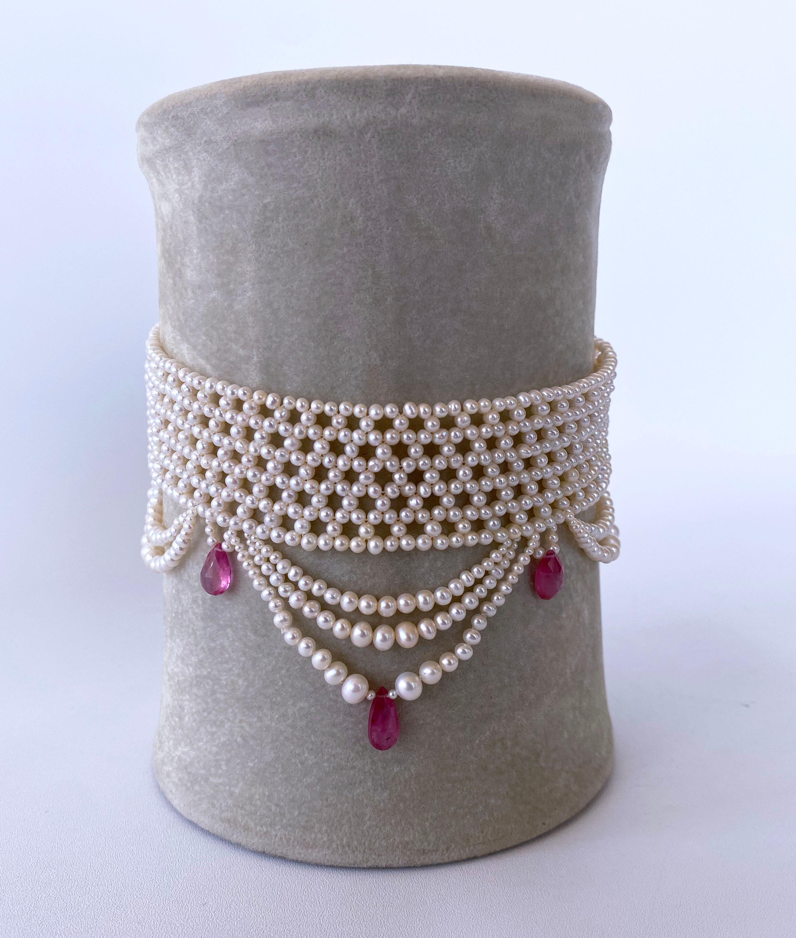 Beautiful piece by Marina J. This gorgeous Choker features high luster cream Pearls with great iridescence, all intricately hand woven together into a tight fine lace design. Amazing faceted Pink Sapphire briolettes hang from the necklace, which