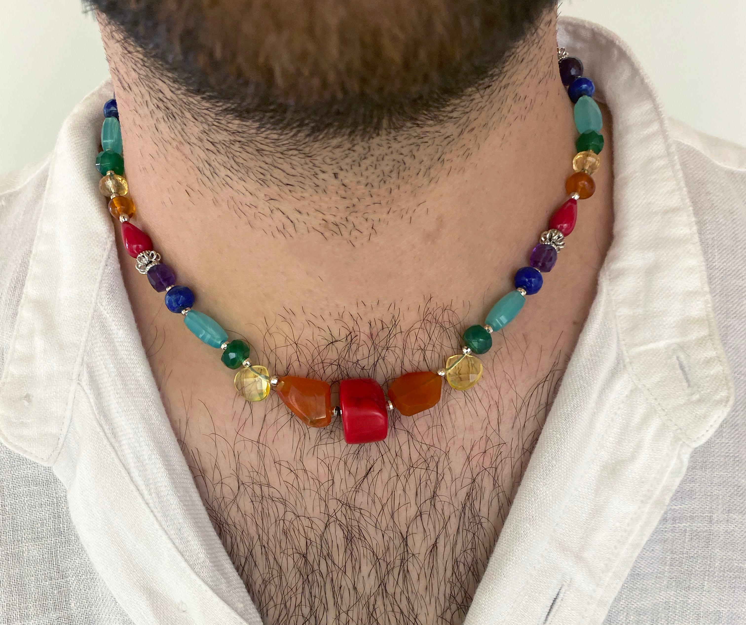 This Rainbow necklace represents a style acknowledging a diversity celebrating people of all shapes and colors, perfect to show  Pride solidarity .
Adorned with beautiful multi faceted and multi shaped Coral, Amber, Citrine, Green Onyx, Aquamarine,