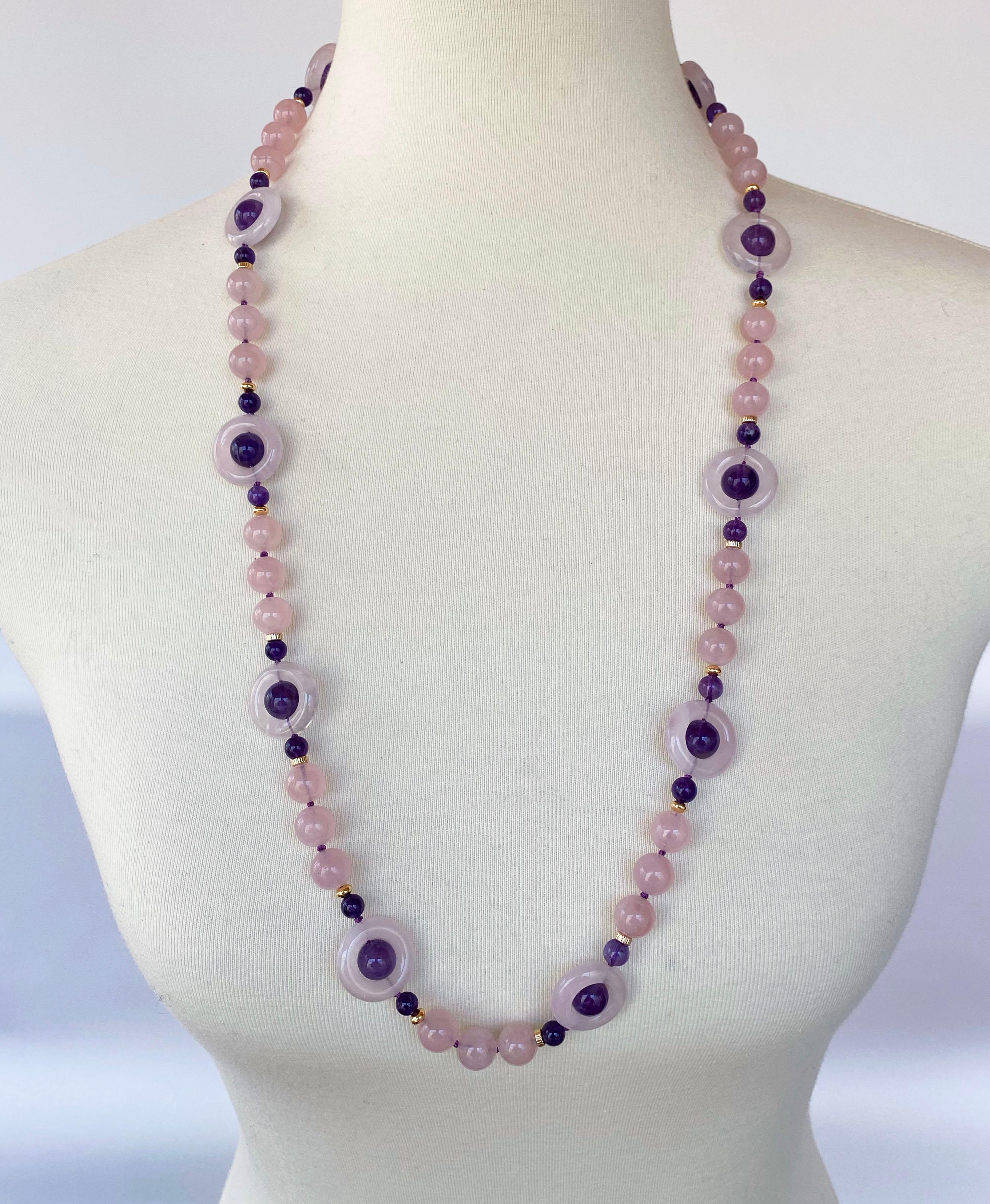 Gorgeous stone necklace by Marina J. This lovely piece is made using multi shaped Rose Quartz, Amethyst and 14k Gold Plated Silver Vermeil findings. Due to their translucent nature, the Amethysts and Rose Quartz radiate wonderful hues of color when