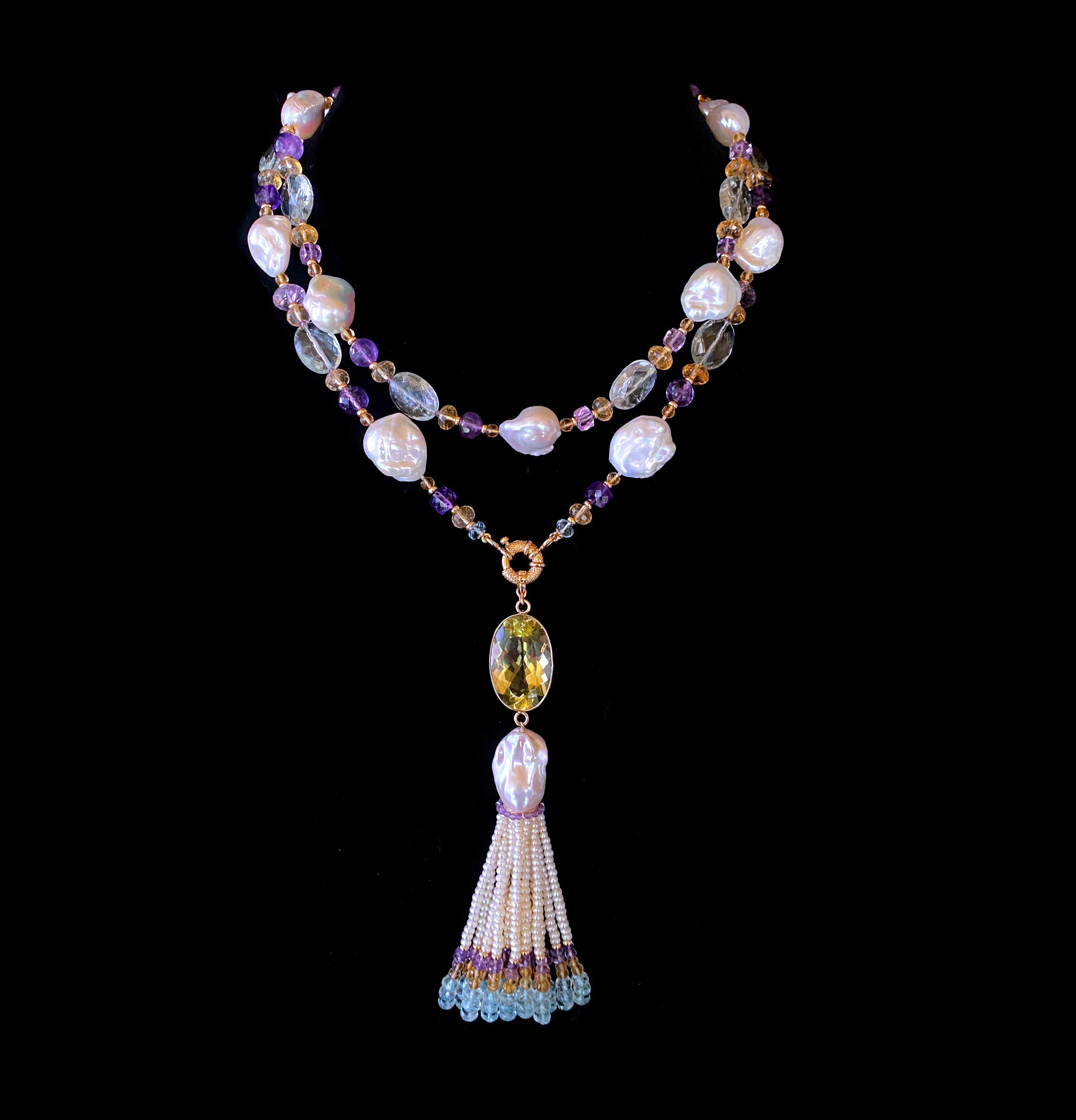 This amazing piece features multi shaped and colored Semi Precious gems and Pearls all strung together into a a gorgeous One Of A Kind Semi Precious Sautoir. Two tones of Purple Amethyst, Green Amethyst, Citrine, Aquamarine and solid 14k Yellow Gold
