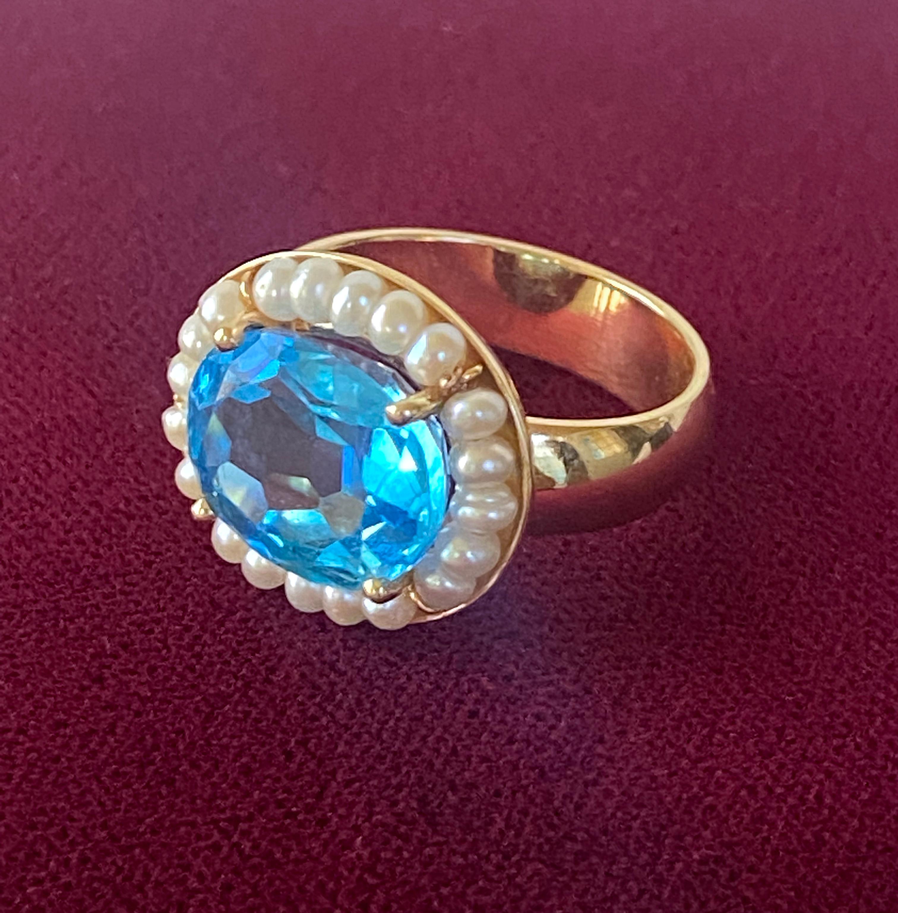 Brilliant Cut Marina J. Sky Blue Topaz Ring with Seed Pearls and 14 Karat Gold Band