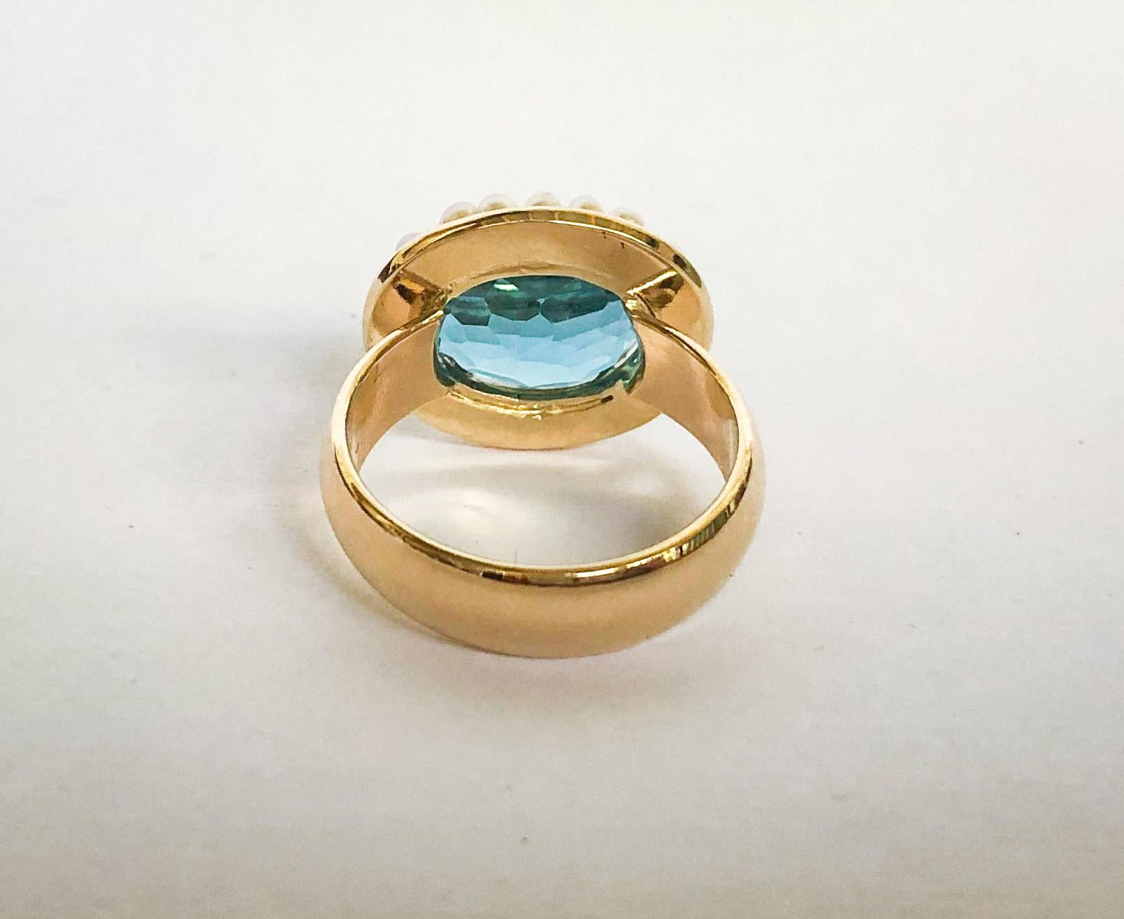pearl and blue topax ring