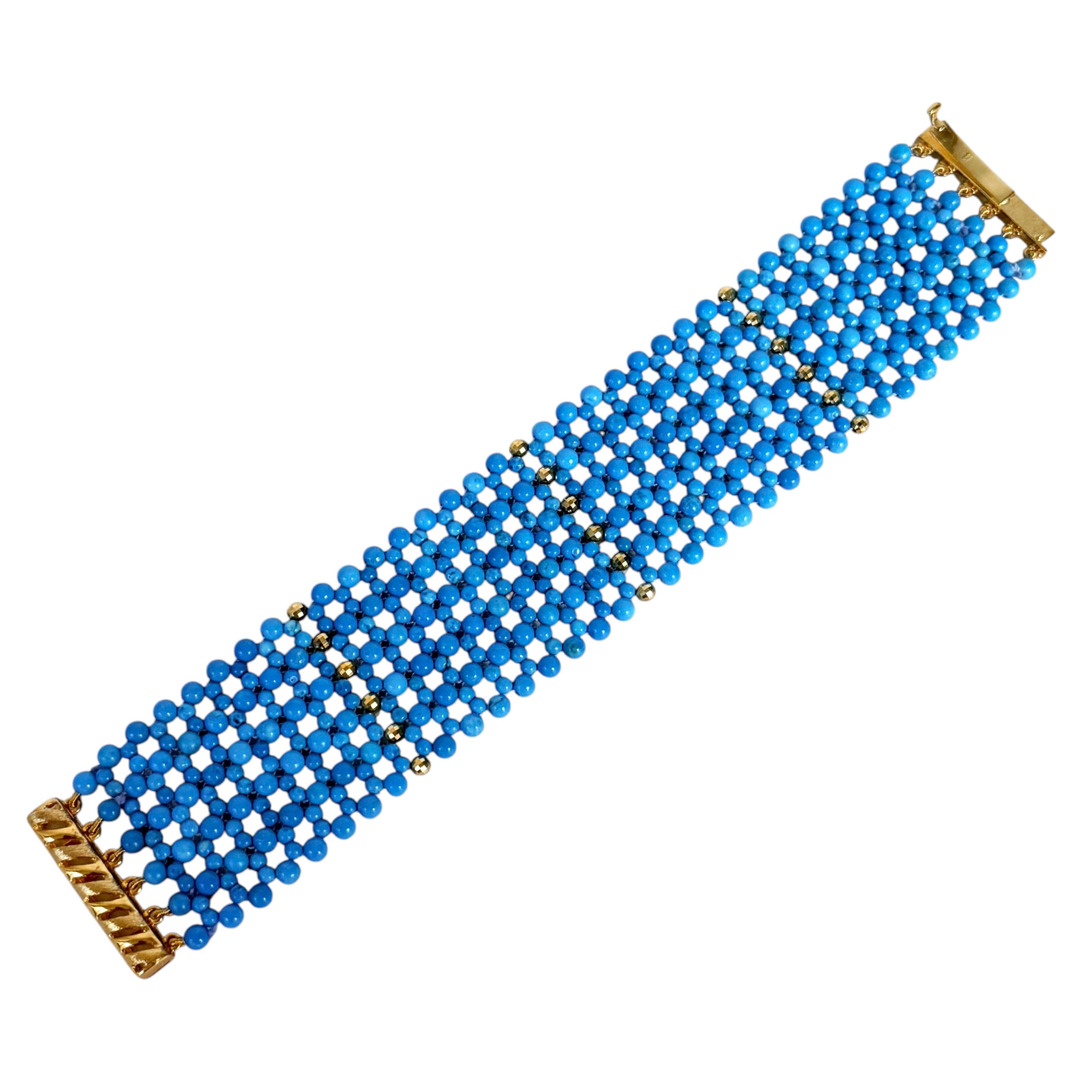 Marina J. Bracciale con perline turchesi intrecciate, chiusura placcata oro sfaccettata e perline