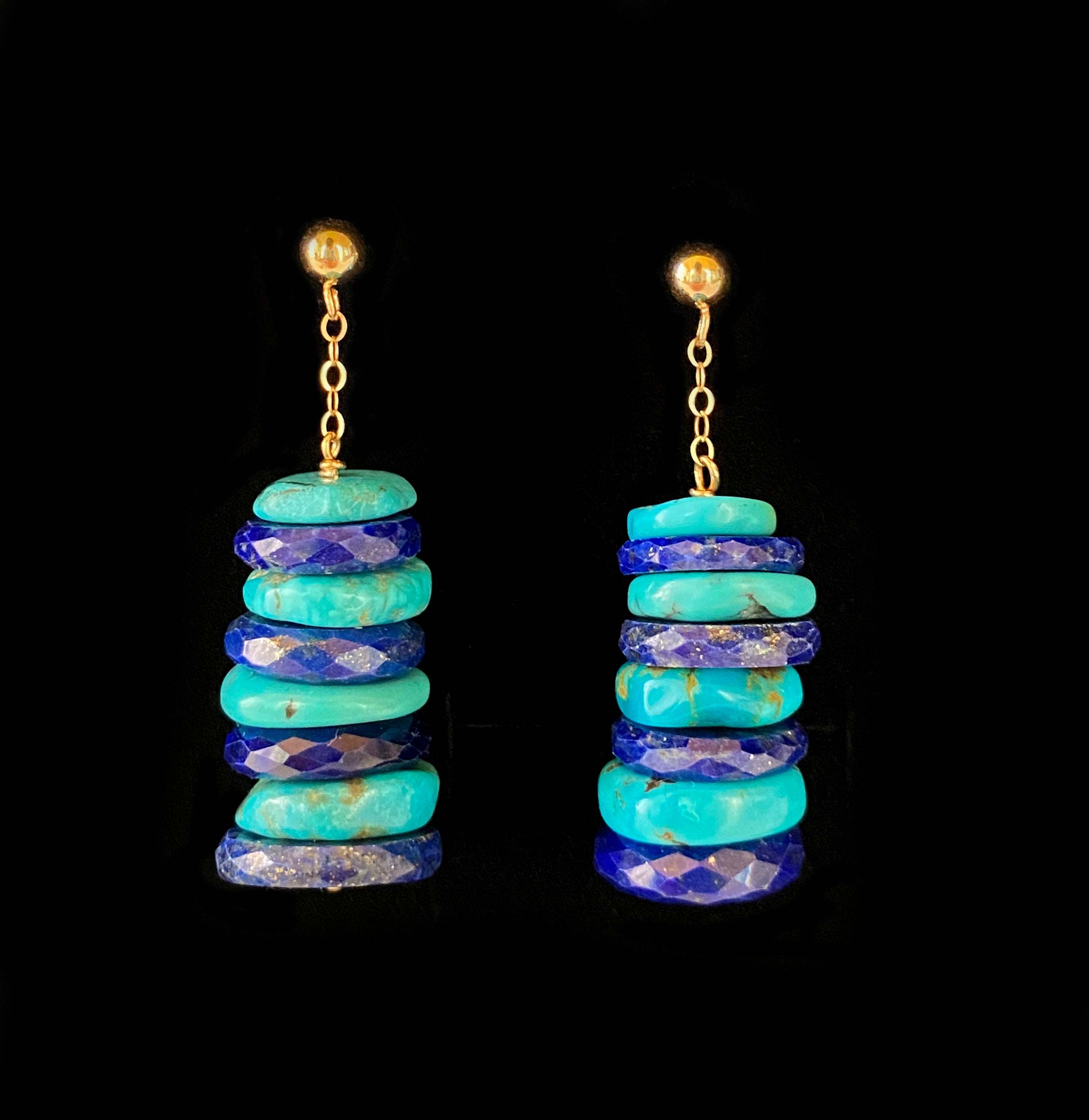 Vibrant pair by Marina J. These vividly colored Earrings are made using all natural and faceted Turquoise and Lapis Lazuli flat beads, displaying radiant hues of Blue! Measuring a of 1.75 inches long total, this pair of Studded Earrings features a