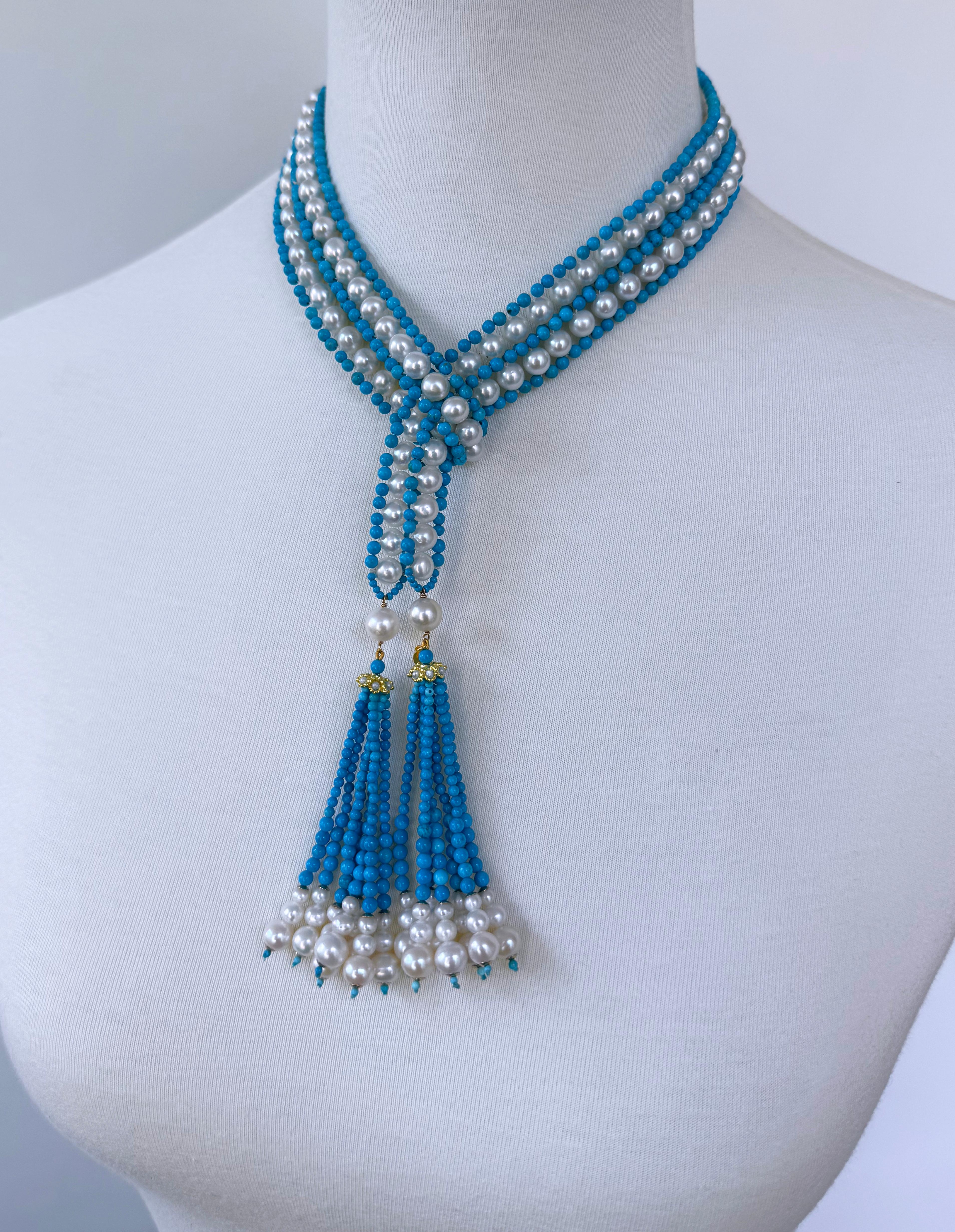 Magnifique pièce de Marina J. Ce Sautoir est composé de turquoise, de perles et d'or jaune 14 carats massif tissés ensemble pour former une sorte de colonne. Les Turoiqes de cette pièce sont d'un bleu éclatant qui convient parfaitement à tout