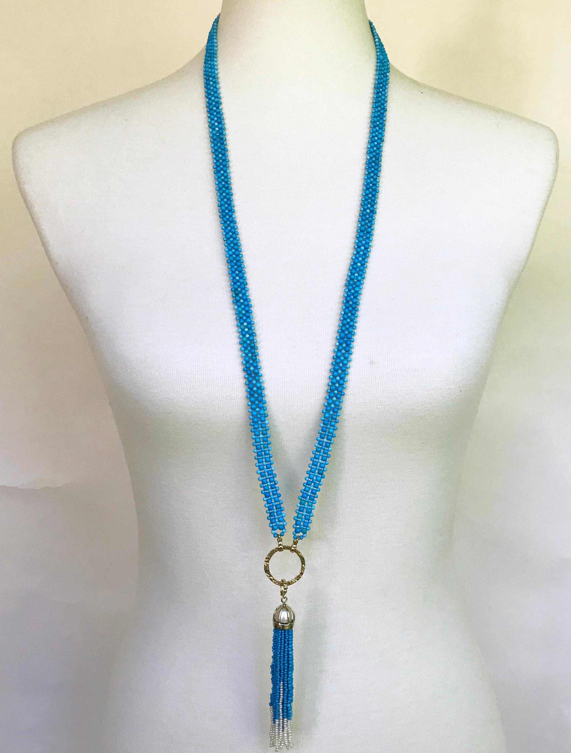 This unique lace-like woven turquoise necklace with pearls and 14k yellow gold is perfect to enhance any outfit with the vivid and bold colors. Elegant and comfortable, this piece was handwoven by Marina J, creating a style that sits comfortably and