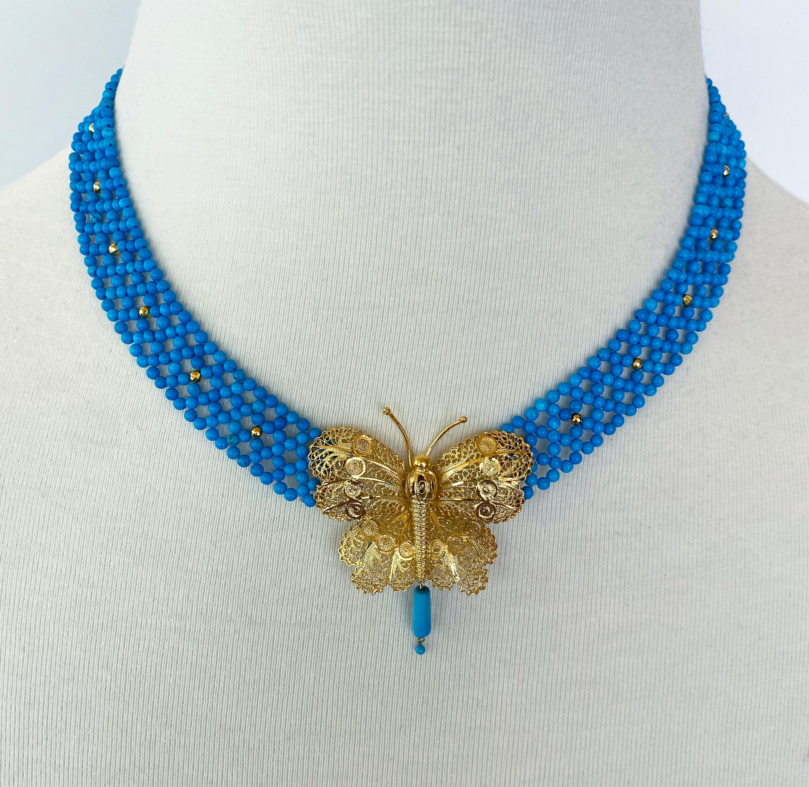 Beautiful One of A Kind Necklace by Marina J. A Vintage 18k Yellow Gold Plated Butterfly Brooch with intricate filigree detailings has been reworked into a stunning Centerpiece. The Butterfly is attached to a Lace Woven Turquoise band with faceted