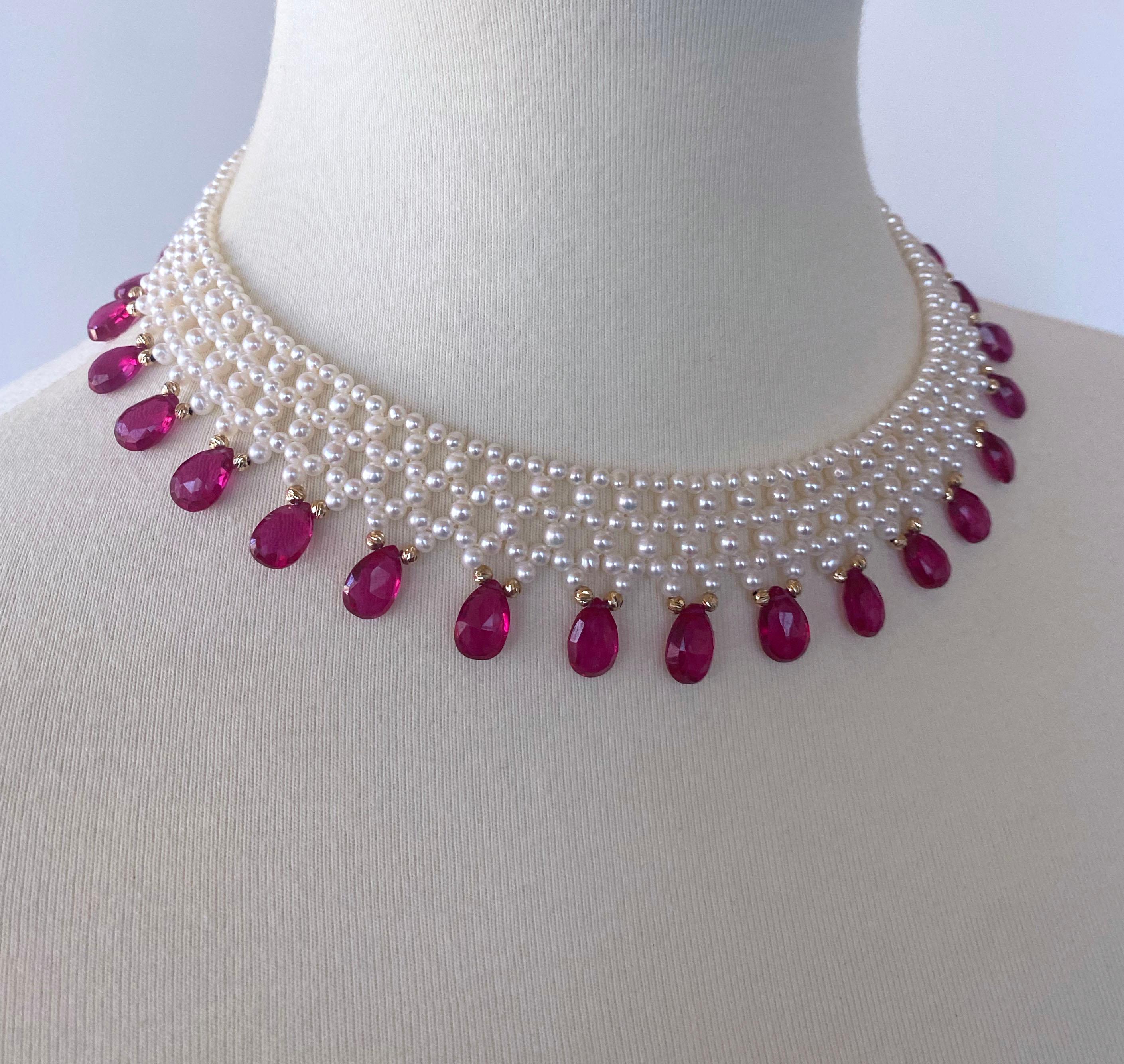 This gorgeous hand made pieces features high luster Cultured white Pearls which display a beautiful iridescence, all woven into a tight Lace like design. Stunning and highly saturated Pink Sapphires adorn this necklace and are further accented by