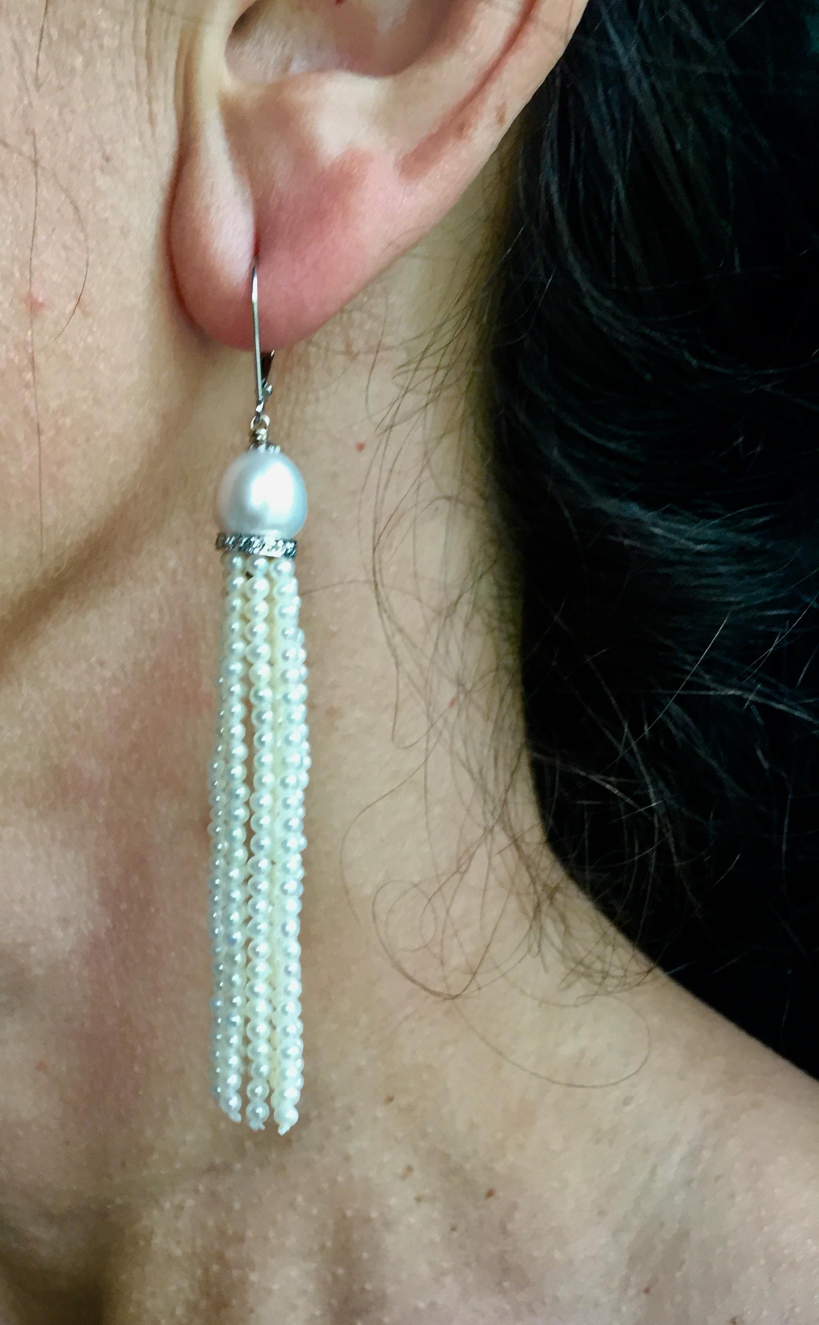 Donna Marina J. Orecchini con nappe di perle coltivate bianche e oro bianco 14 carati  in vendita