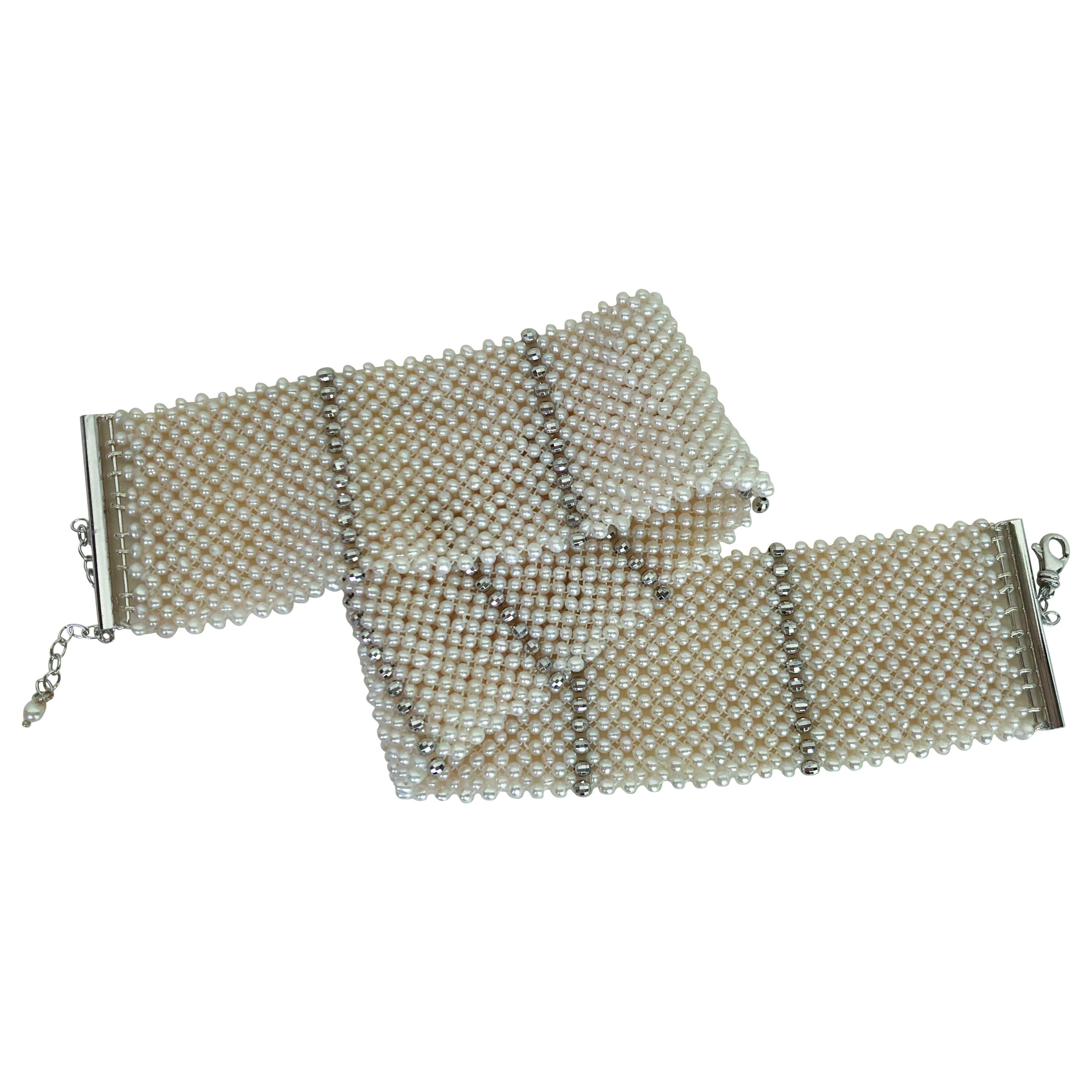 This stunning woven pearl choker with columns of silver rhodium-plated beads has a handmade silver rhodium-plated adjustable clasp, easy to put and secure once in place. The sparkling faceted silver beads glows and accents the gorgeous pearls that