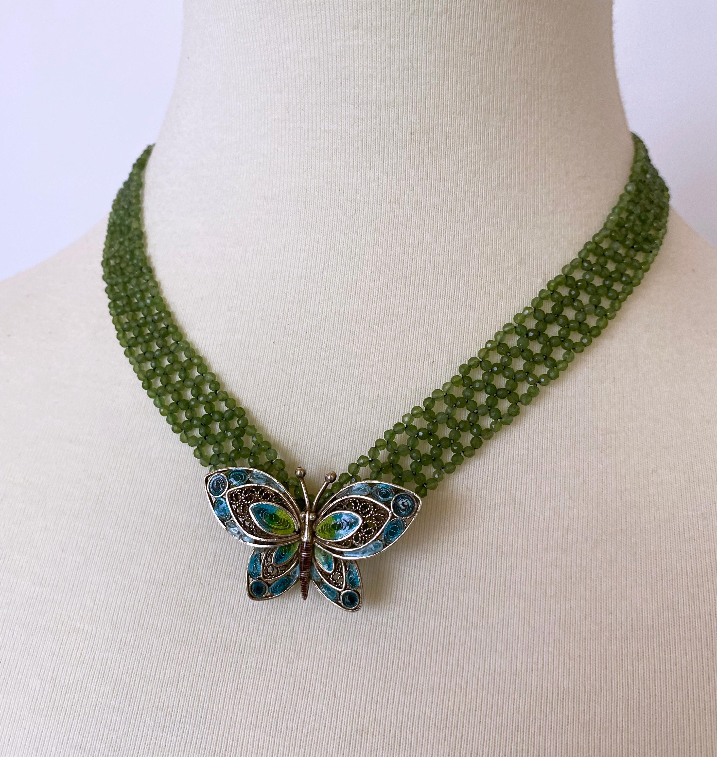 Beautiful stone necklace by Marina J. This lovely V Necklace is made using all faceted Peridot stones woven together into a fine lace like design. The small Peridots display a beautiful hue of medium green and their translucency allow them to