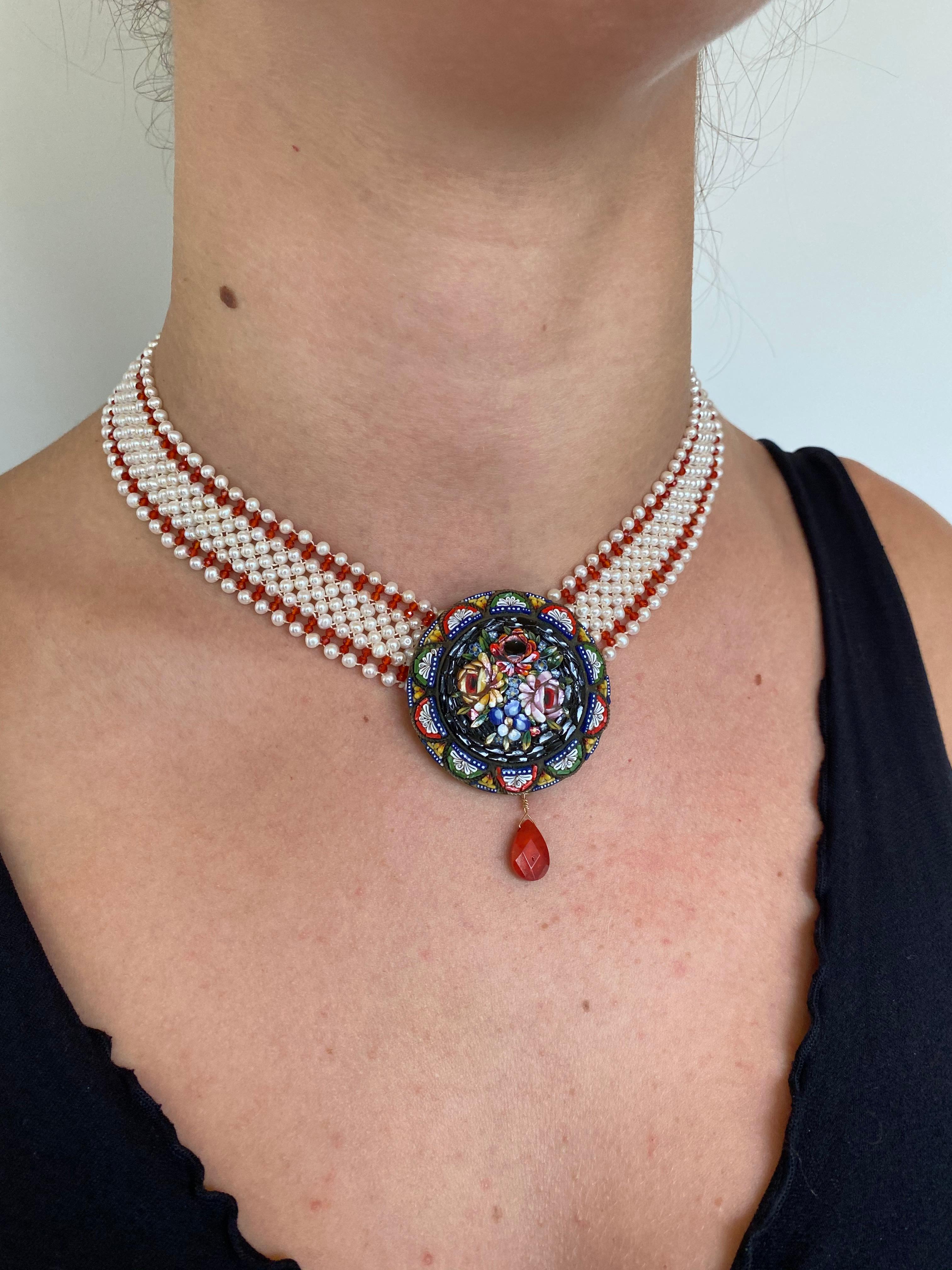 Gorgeous hand woven Pearl necklace by Marina J. This necklace is made with a slight graduation of Pearls which allows necklace to sit perfectly on the neck. High luster cream Pearls and radiant faceted Carnelian accent and line the beautiful lace