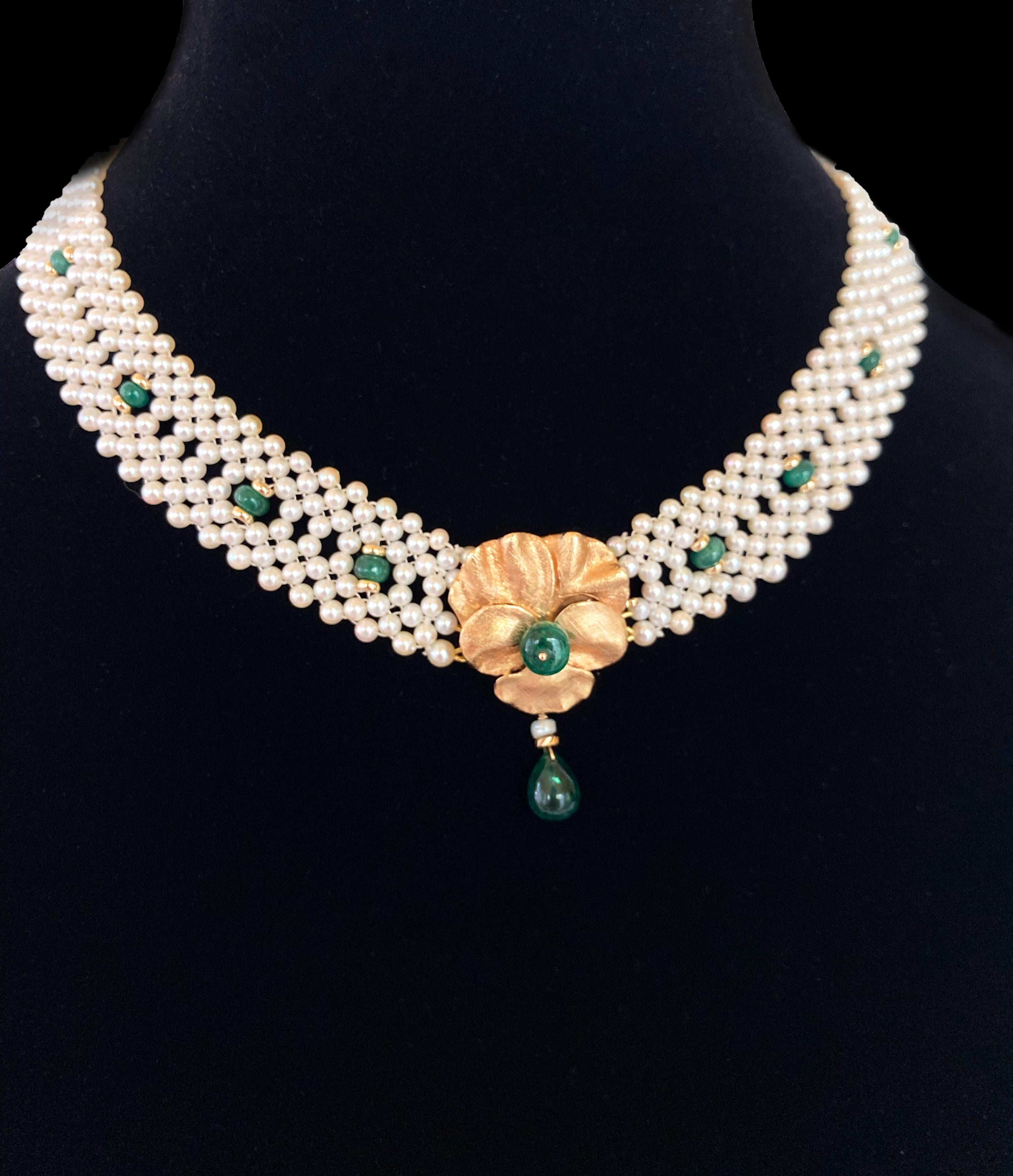 Classic Marina J Necklace hand woven into a beautiful lace design featuring high luster White Pearls, Bright Emerald beads and 14K Yellow Gold accents. This piece meets at a gorgeous Vintage 14K Yellow Gold Centerpiece which has been repurposed into