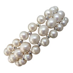 Marina J. Bracciale di perle intrecciate con perle d'argento sfaccettate e chiusura scorrevole in argento