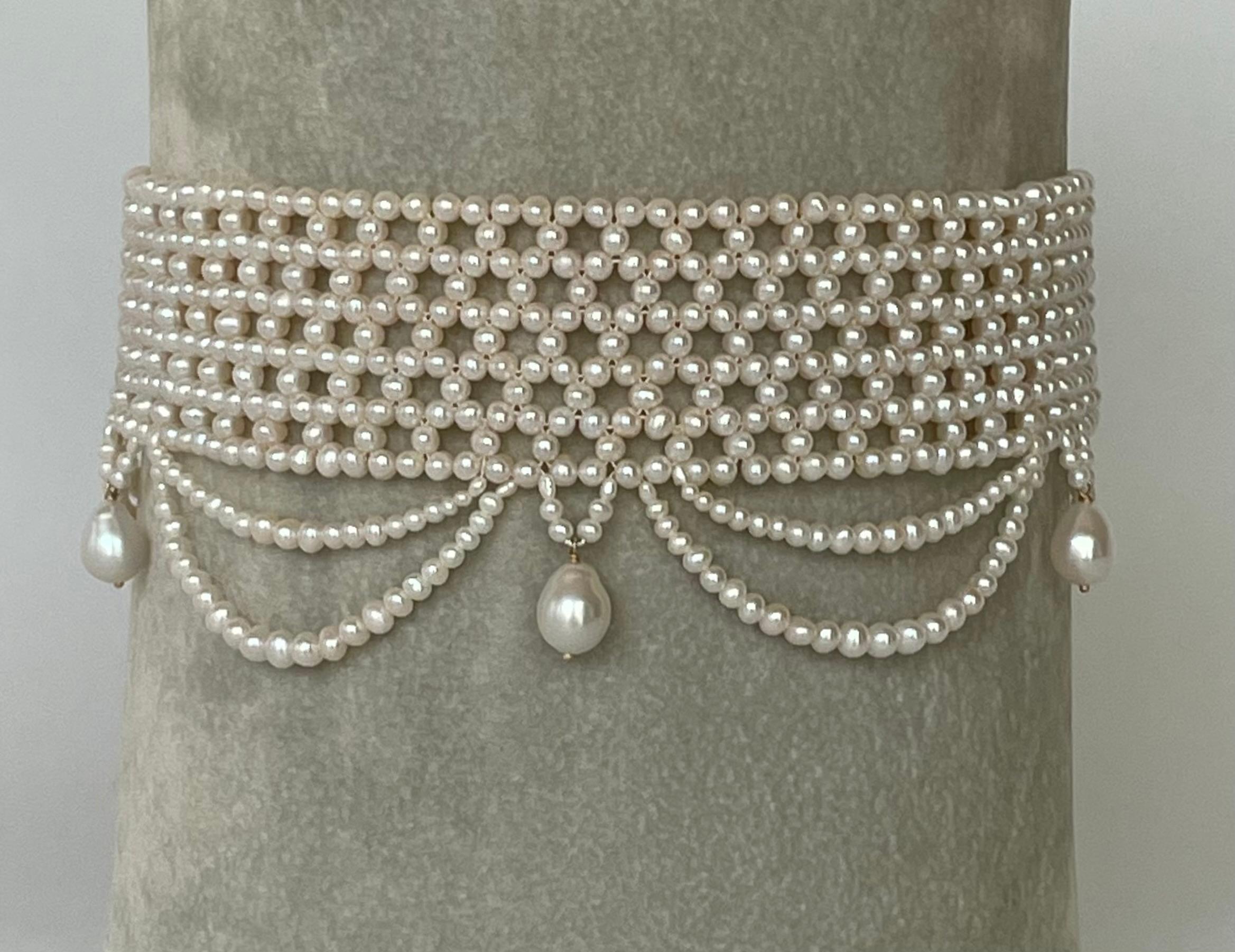 
-- This beautiful handwoven pearl choker has pearls from 2.5mm to 3mm. The necklace is intricately handwoven to create a “lacelike” design.  The Choker is tapered in design to fit along the curve of the neckline. The clasp is made of rhodium plated