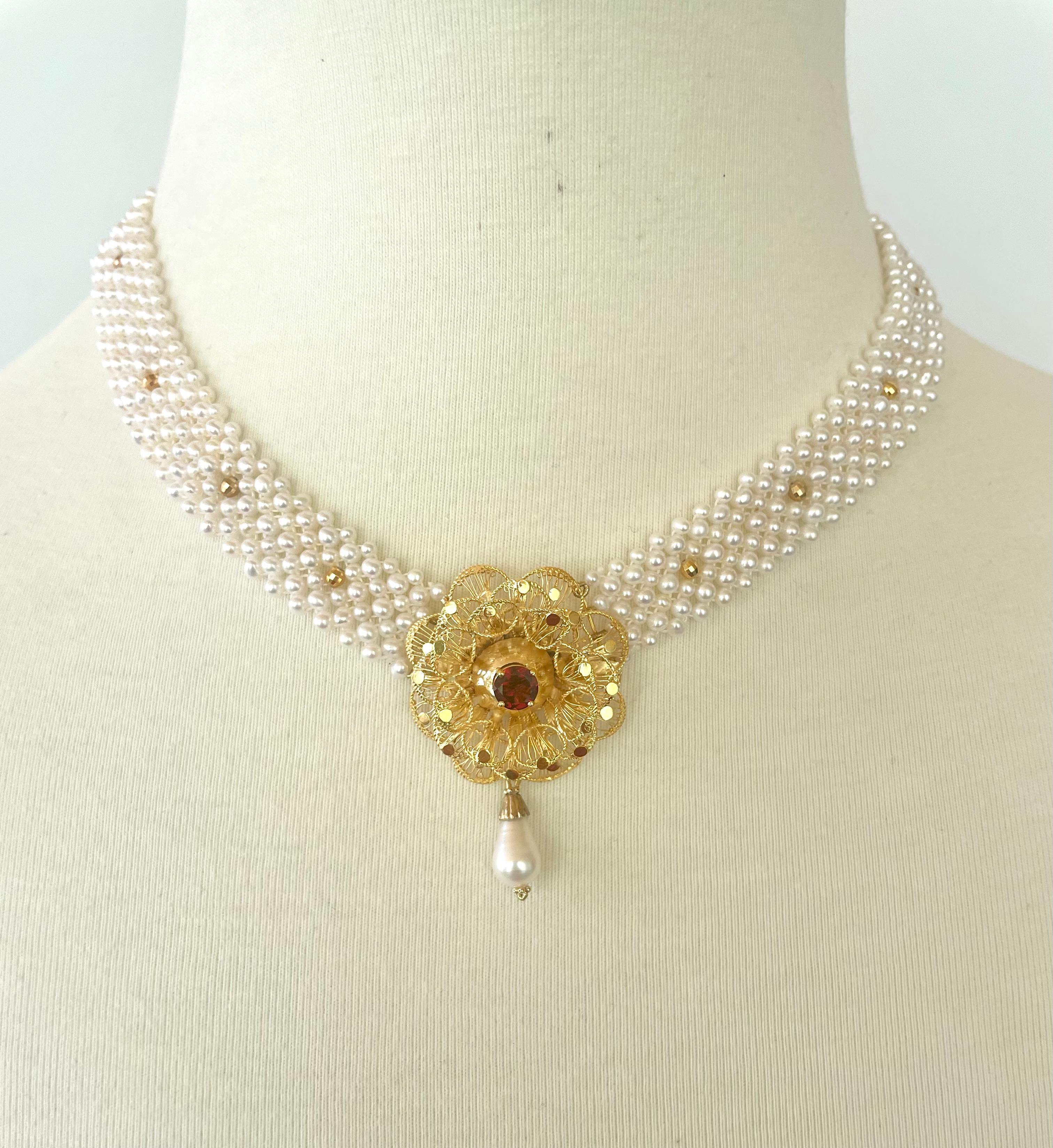 Beautiful Pearl Necklace by Marina J. This amazing piece features Cultured white Pearls all intricately woven together into a tight lace like design. Small gold-plated silver faceted beads are interwoven within the necklace. Vintage gold-plated
