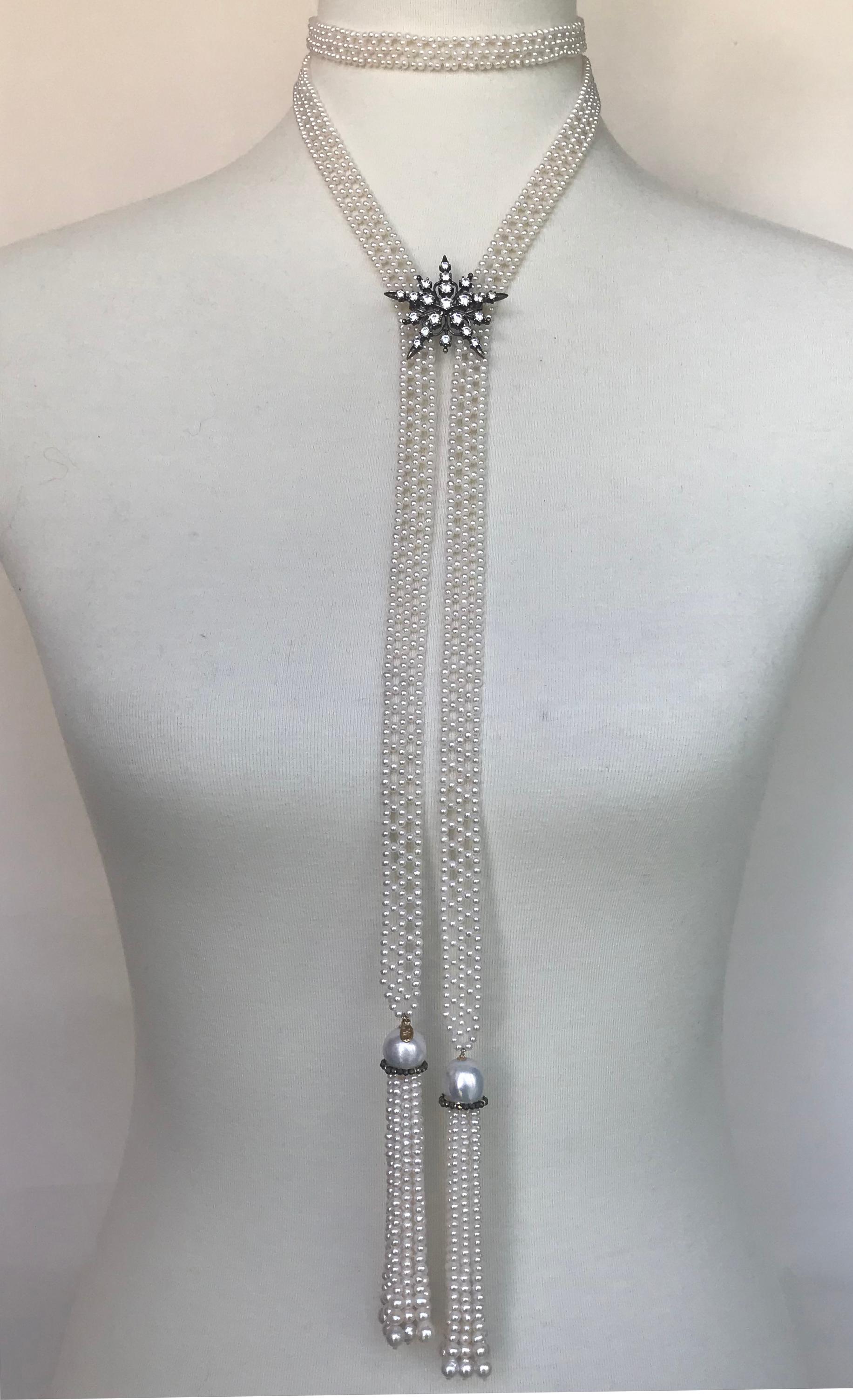 Marina J. Presents a classical and sophisticated woven white pearl sautoir, lace-like design, with baroque pearls and 14k yellow gold. The beautiful tassel has a large baroque pearl on top of a 14k yellow gold roundel with encrusted black spinel
