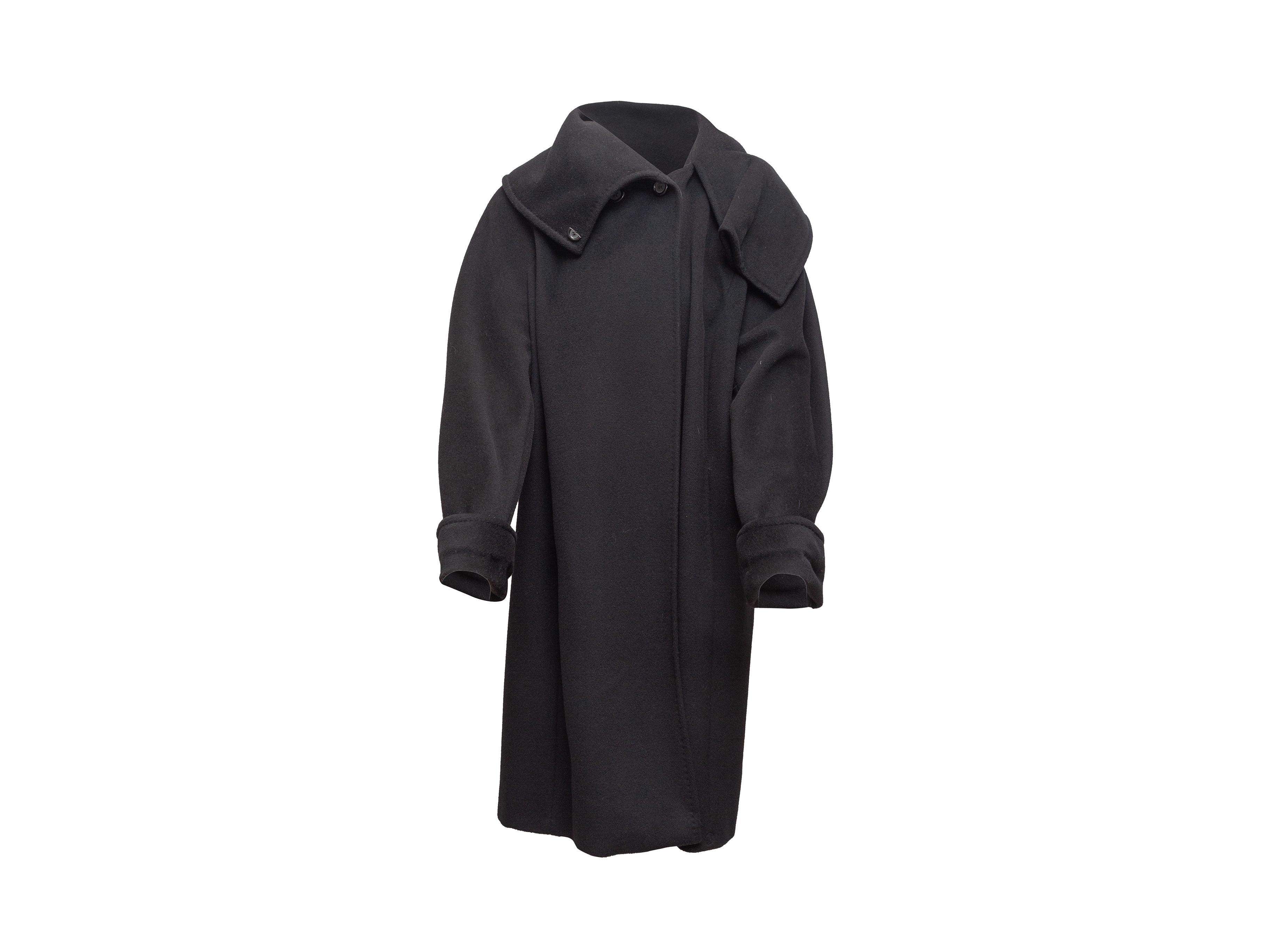 Product details: Black virgin wool and cashmere-blend coat by Marina Rinaldi. Oversize folded collar. Dual hip pockets. Button closures at front. 46