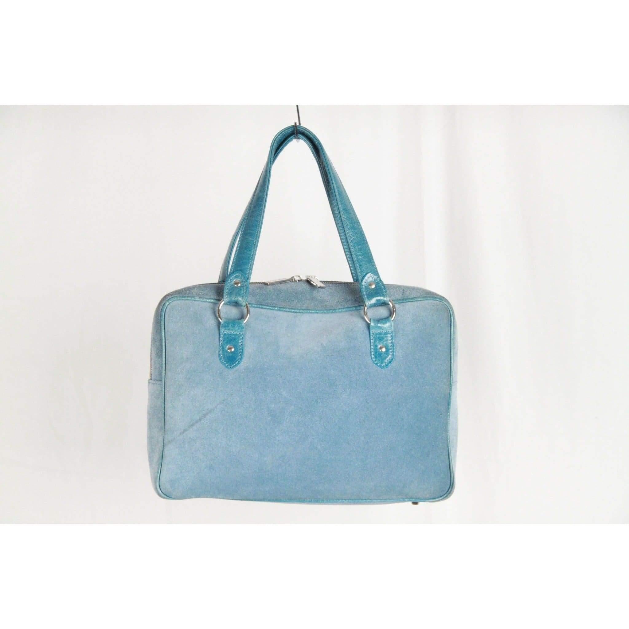 MATERIAL: Suede COLOR: Blue MODEL: Satchel GENDER: Women SIZE: Medium Condition CONDITION DETAILS: B :GOOD CONDITION - Some light wear of use - Some normal wear of use on bottom corners, minimal darkness on leather, a couple of small stains on the