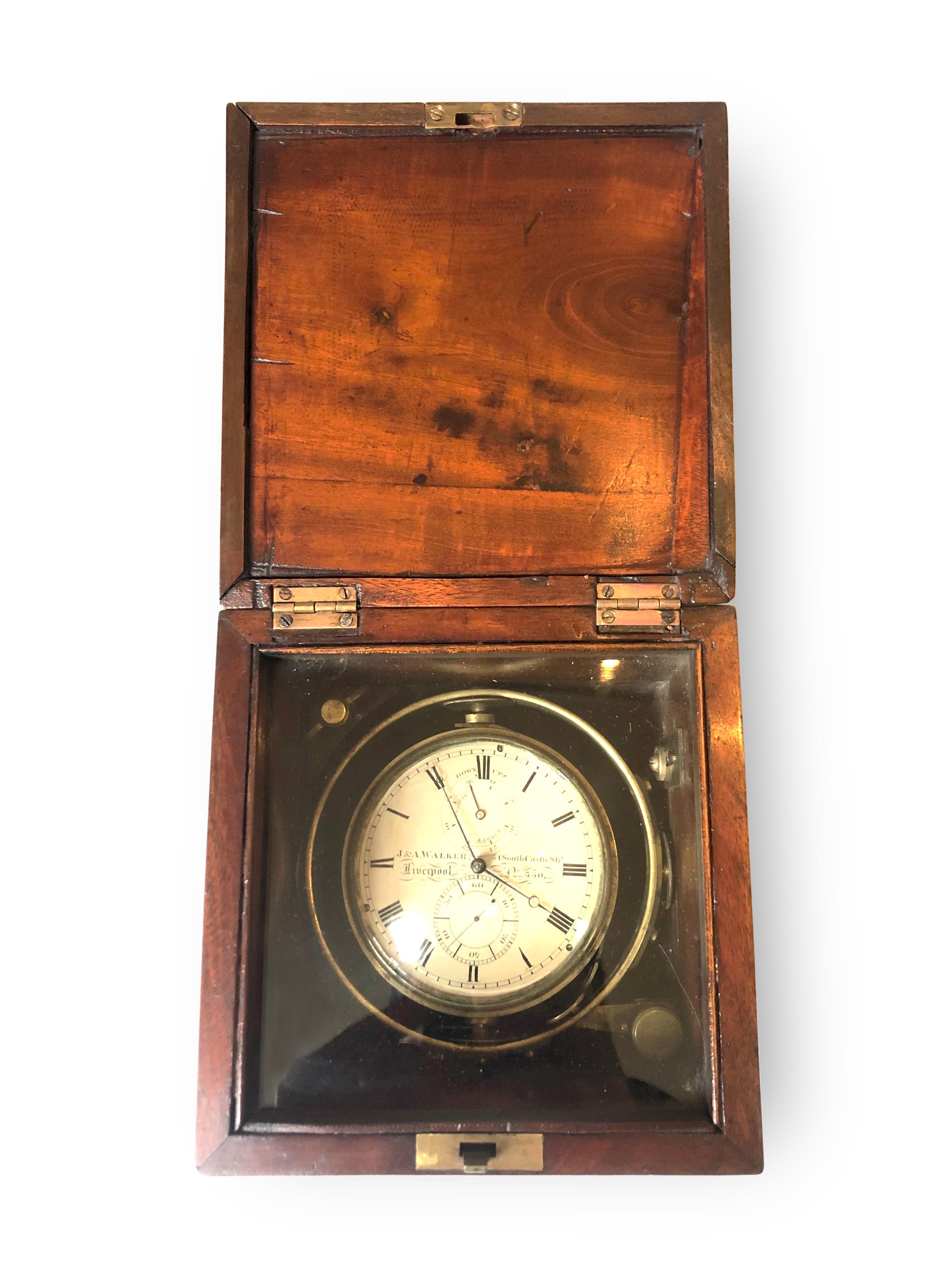 Marine chronometer
J & A. Walker South Castle Street Liverpool 19th century mahogany Marine Chronometer two stage case with Bone plaques, viewing glass and flush fitting side handles. Enclosing a brass gimble mounted movement with signed and