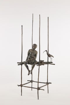 Escultura de bronce de Marine de Soos, Hombre sentado con linterna y pájaro