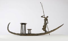 D'une Rive à l'Autre by Marine de Soos - Bronze sculpture, woman on a canoe