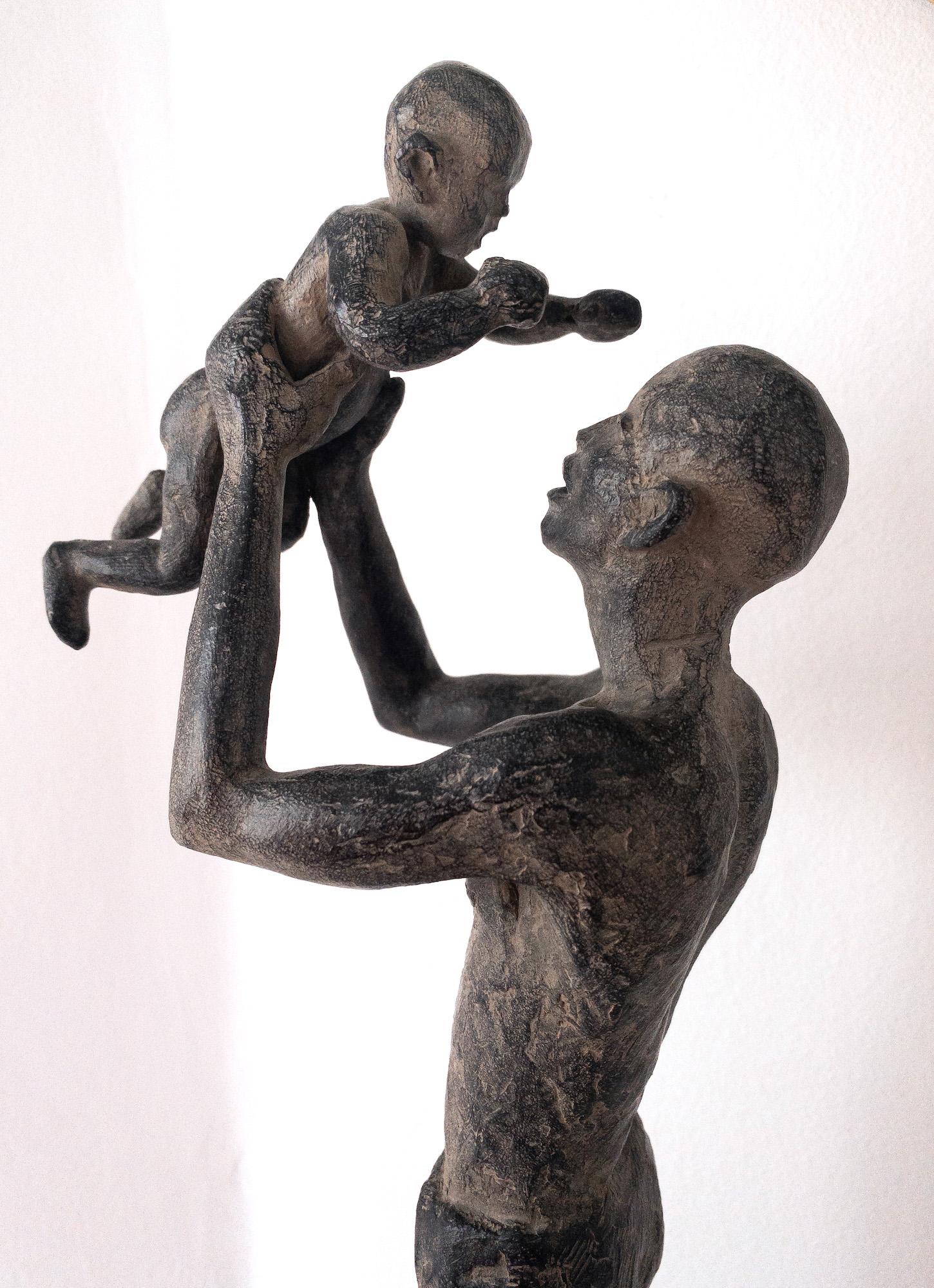 Getting Close to the Sky by Marine de Soos - Bronze sculpture of father and son For Sale 6