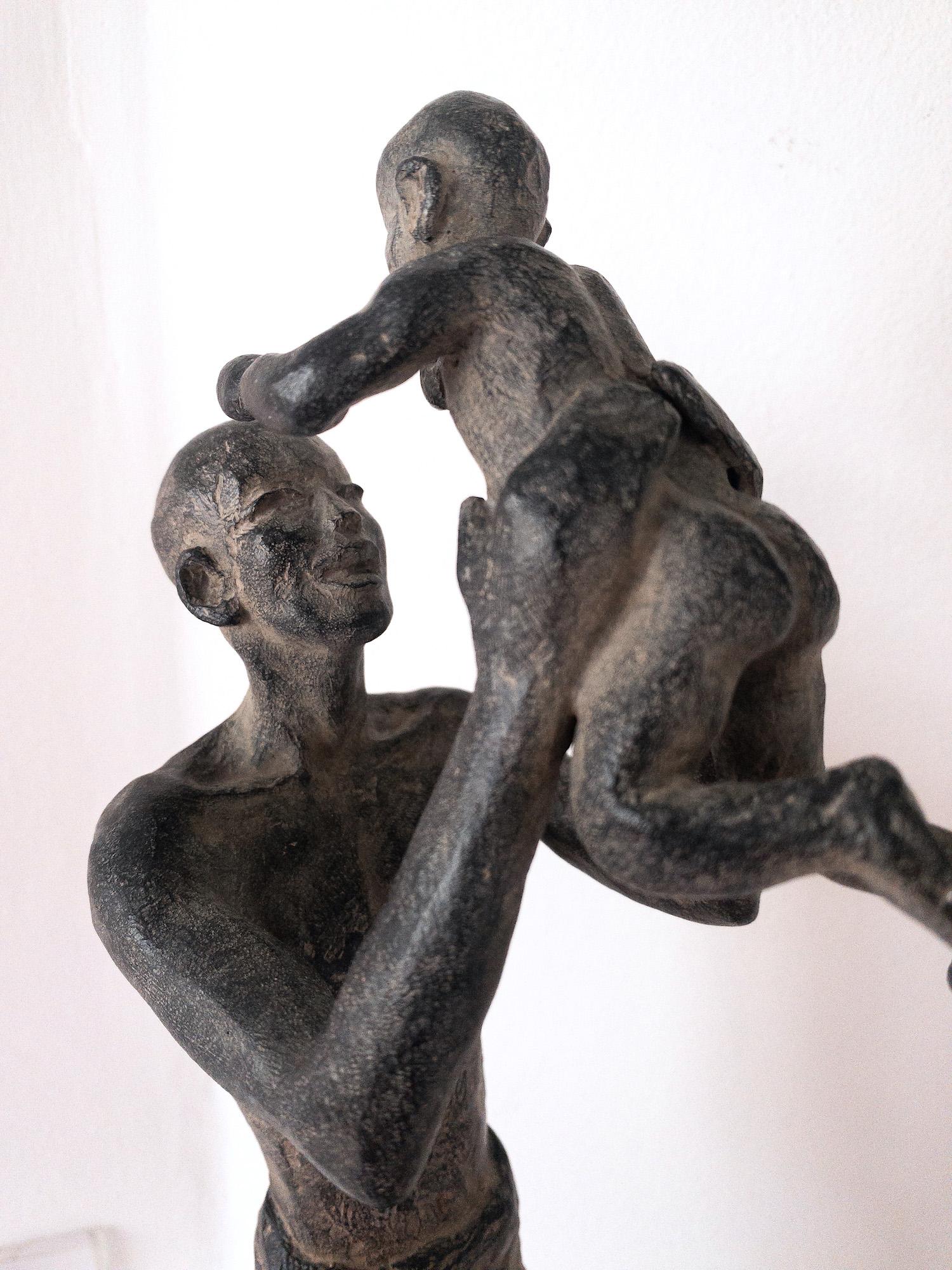 Getting Close to the Sky by Marine de Soos - Bronze sculpture of father and son For Sale 5