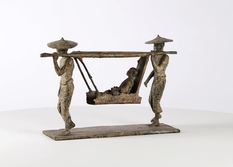 The Sedan Chair (Le Palanquin), bronze sculpture by French contemporary artist Marine de Soos. 24 cm × 37 cm × 11 cm. This sculpture represents a traditional oriental scene: a boy seated in a sedan chair, born by two men wearing Asian style conical