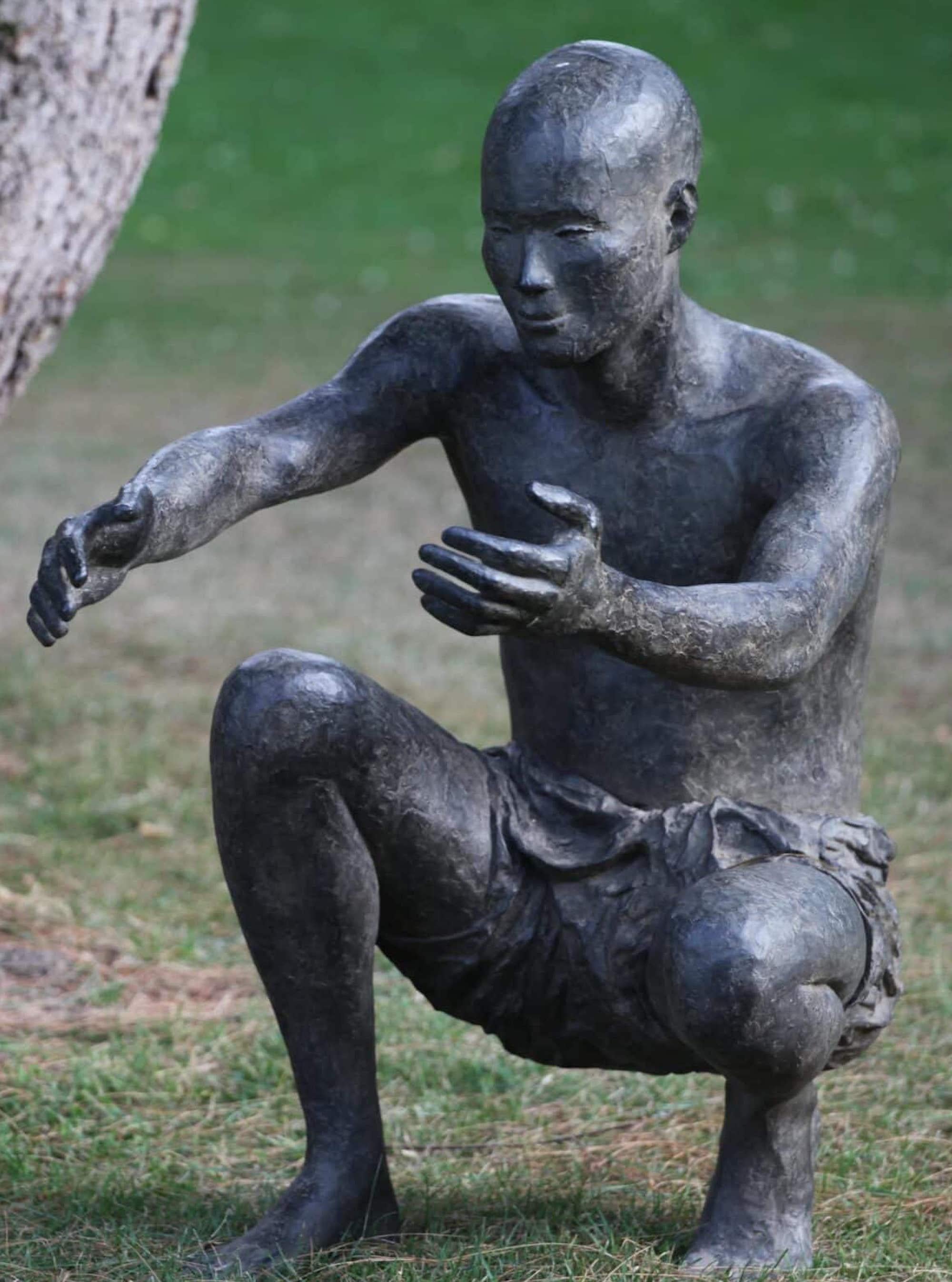 The Welcome by Marine de Soos - Outdoor bronze sculpture, squatting male figure For Sale 3