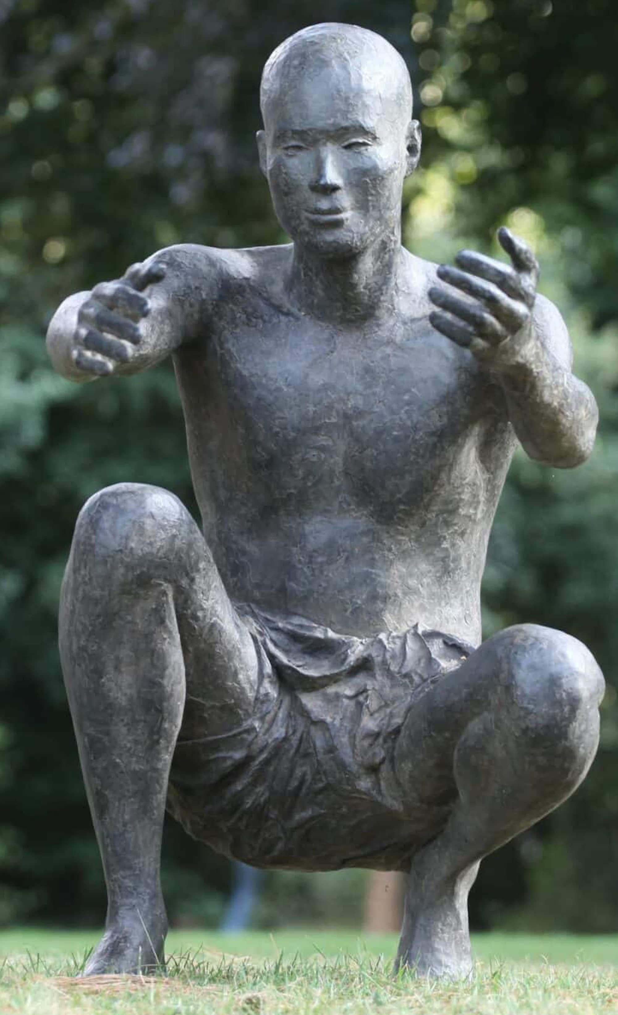 The Welcome by Marine de Soos - Outdoor bronze sculpture, squatting male figure For Sale 4