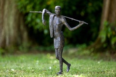 Transhumance by Marine de Soos - Bronze sculpture, human figure, man, walk, dark