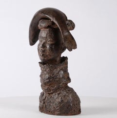 Woman with Fish by Marine de Soos - Bronze sculpture, human portrait, brown tone