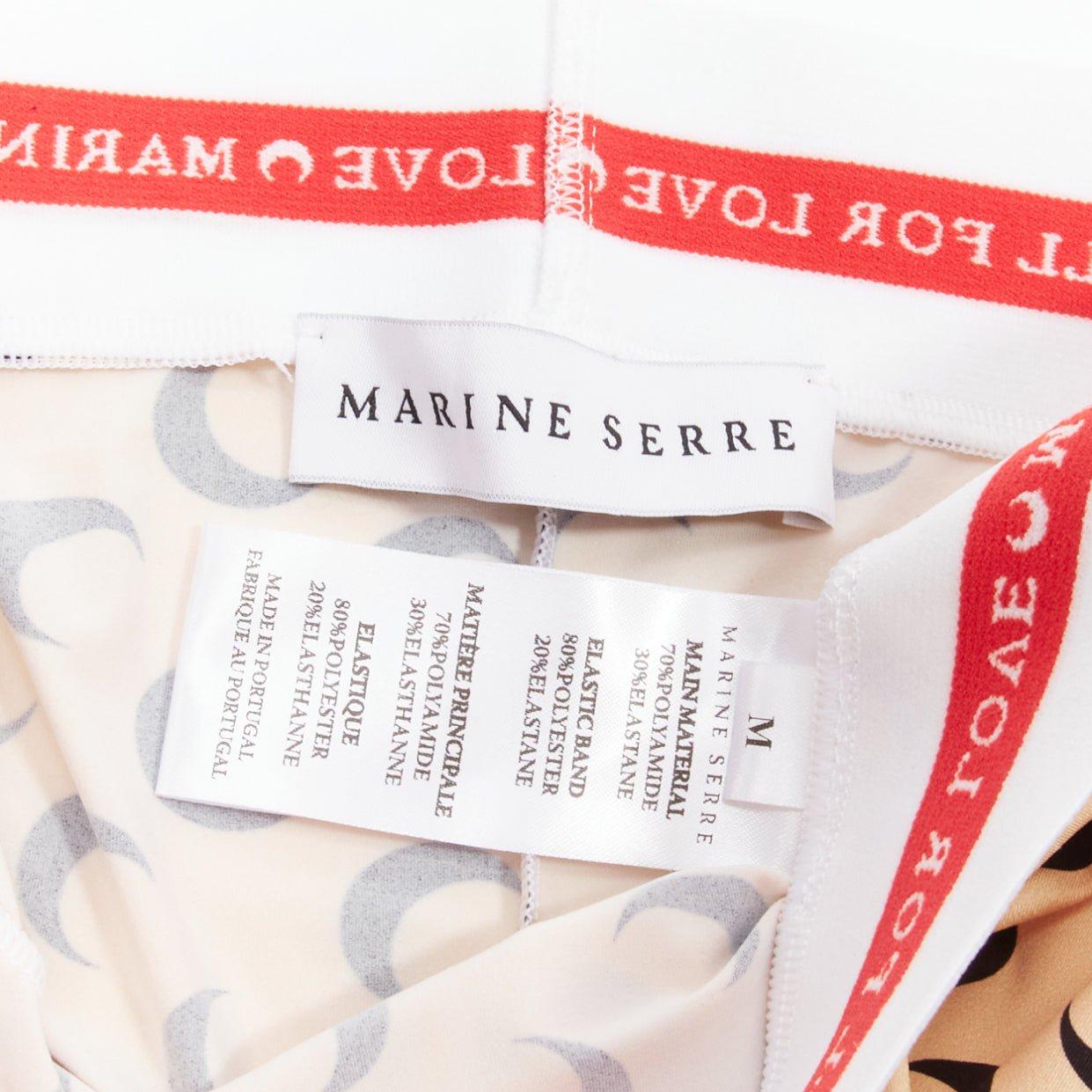 MARINE SERRE Whiteline Fuseaux Crescent Moon medias de cintura con logotipo negro L en venta 3