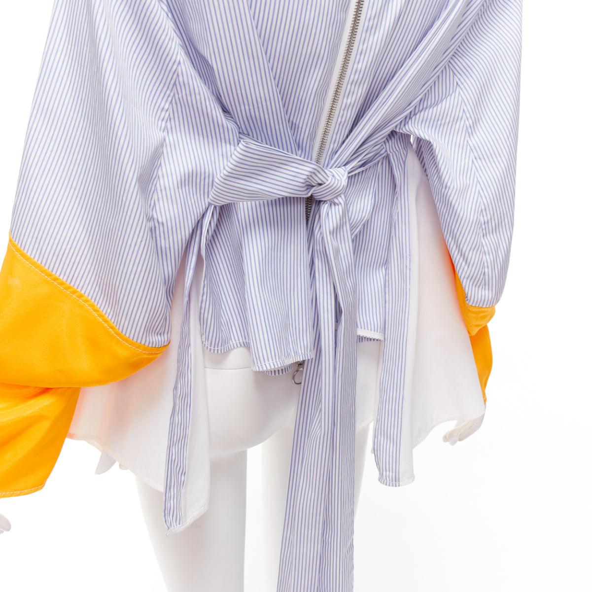 MARINE SERRE yellow blue white pinstriped puff sleeve peplum top M
Reference: CNPG/A00061
Brand: Marine Serre
Material: Fabric
Color: Blue, Yellow
Pattern: Pinstriped
Closure: Zip
Extra Details: Back exposed silver zip with self tie