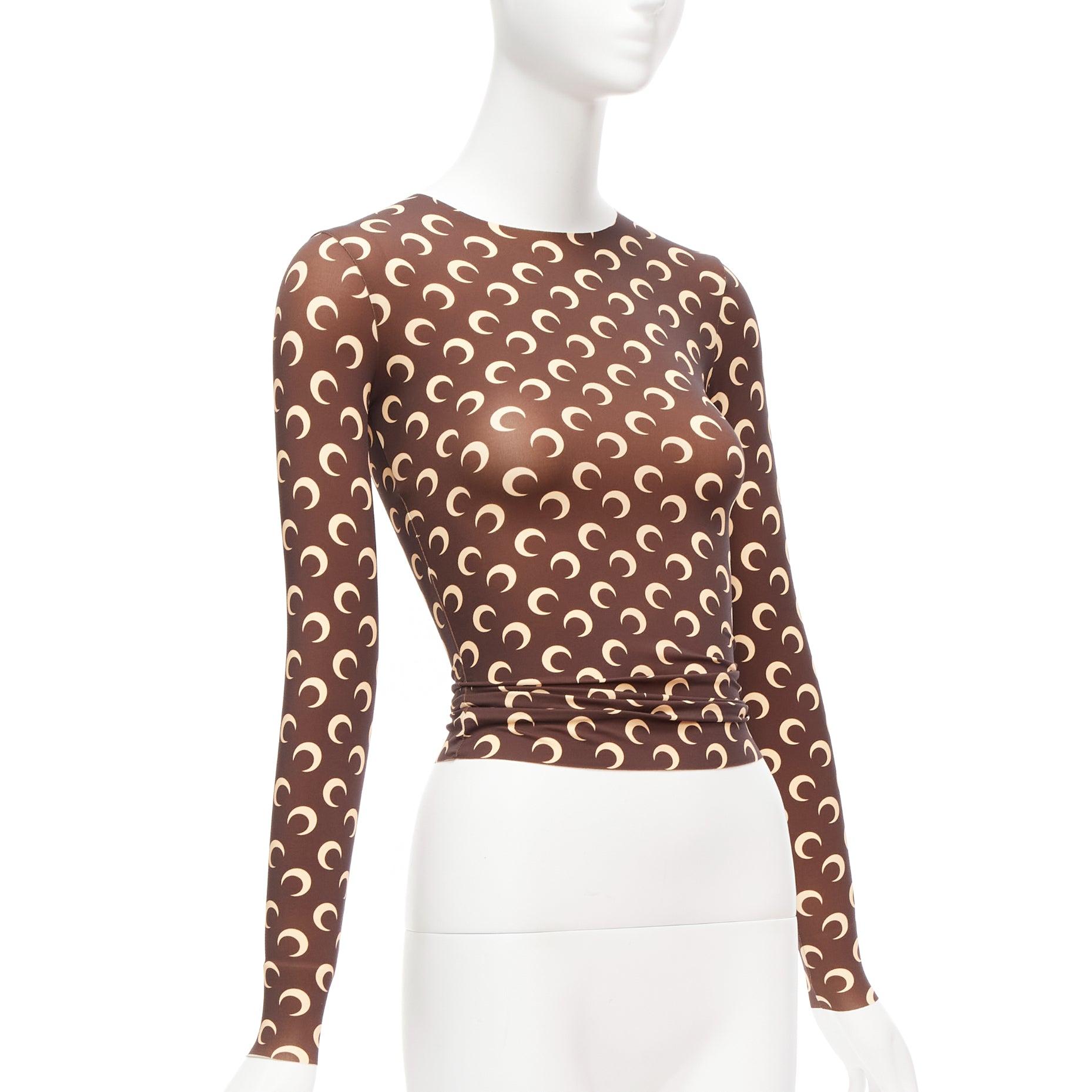 MARINE SERRIE brown Crescent Moon long sleeve second skin fitted top S
Reference: AAWC/A00663
Brand: Marine Serre
Collection: White Line
Material: Polyamide, Elastane
Color: Brown
Pattern: Solid
Extra Details: Skintight fitted top.
Made in: