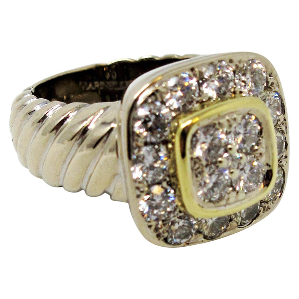 We absolutely adore this stunningly sparkly tiered diamond halo cocktail ring by Marinelli. This remarkable ring makes a bold yet elegant statement with its striking diamonds, subtle texture and fashionable multi-tone gold design. 

This beautiful