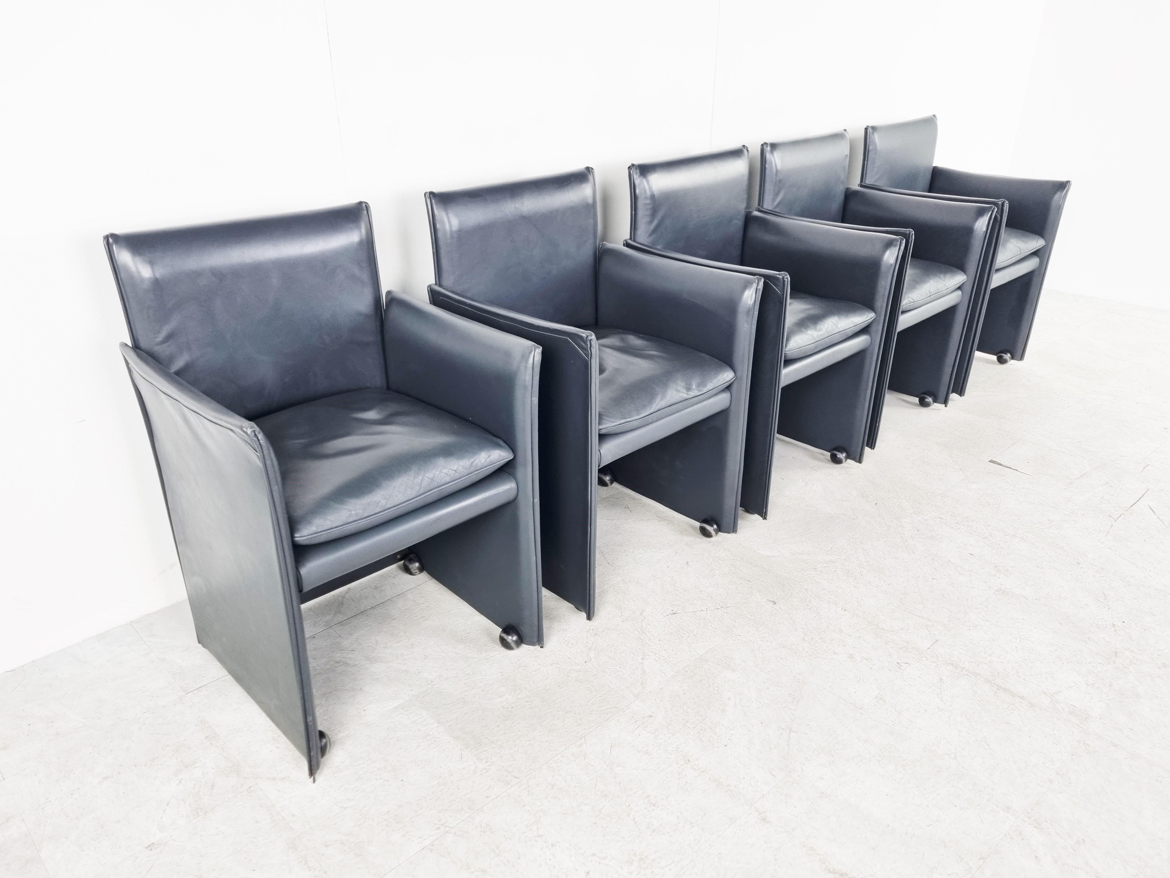 Grey leather 401 break chairs designed by Mario Bellini and produced by Cassina.

The chairs are in perfect condition and are of a very high quality, as expected from Cassina furniture.

The chairs have 4 casters which make them glide smoothly