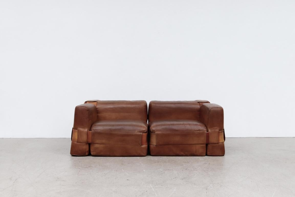 Mid-century Mario Bellini '932 Quartet' Sofa for Cassina. Amazing 2 seater natural leather sofa with visible patina and incredible design. In original condition with visible wear and heavy patina, including visible scratching. Wear is consistent