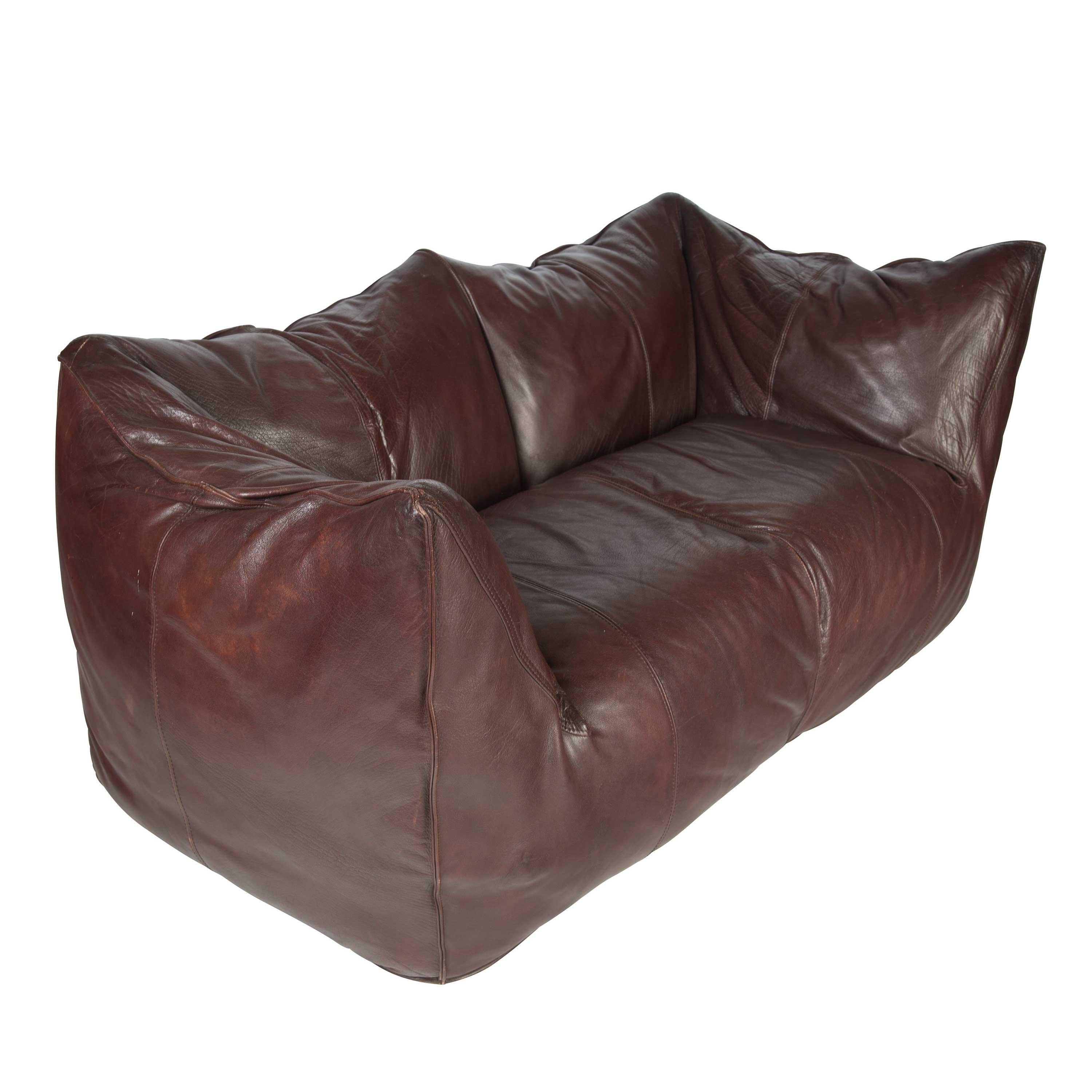 Iconic leather sofa designed by world renowned architect and designer Mario Bellini for B&B Italia during the 1970s. Upholstered in original buffalo leather.
    