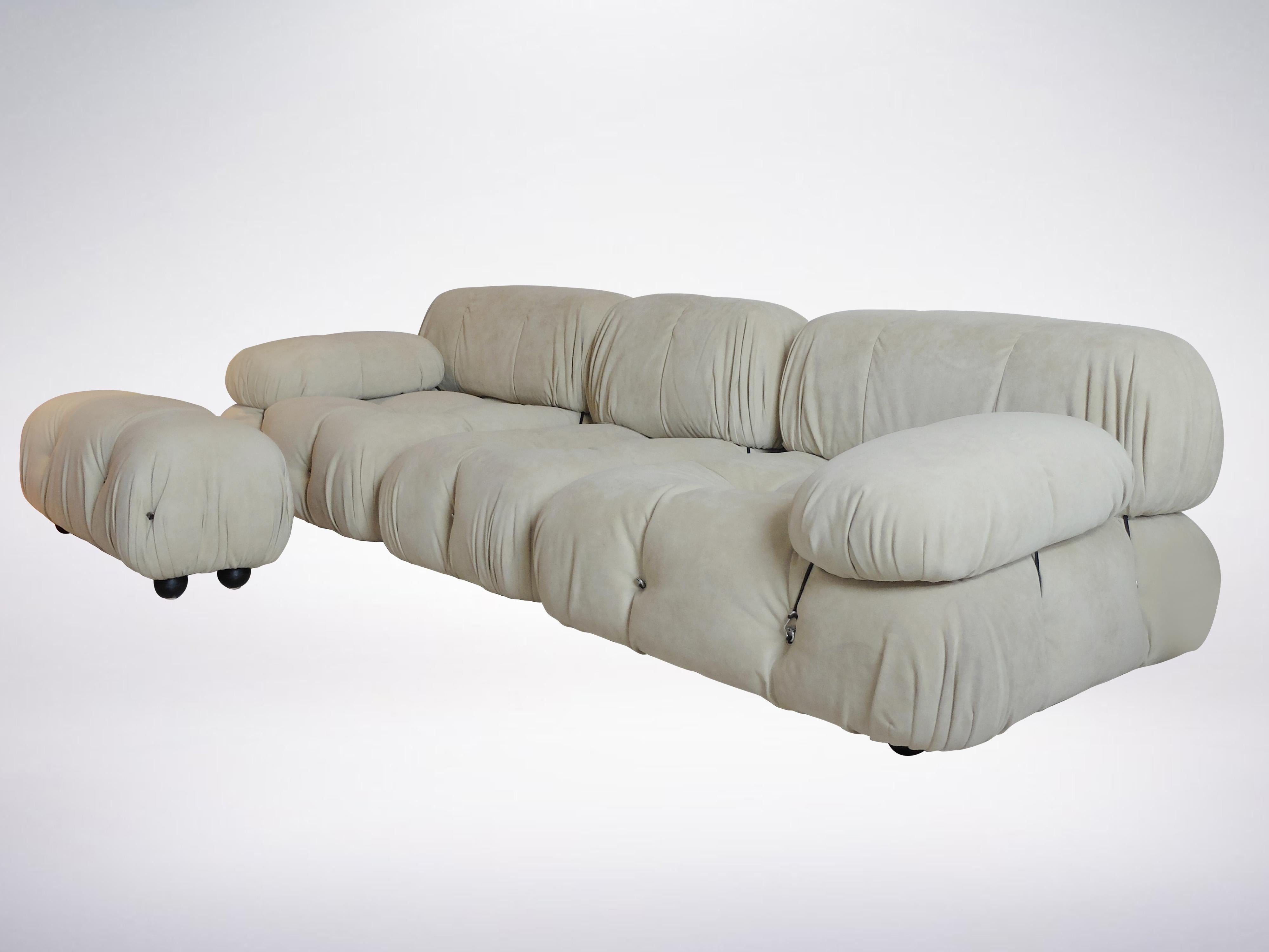 Mario Bellini Camaleonda sofa set of 4 elements in a lush alcantara white upholstery, made for B&B Italia in 1970. The set also includes rare ottomans (foot-rests) that are re-upholstered in matching fabric.
Original company logo markings