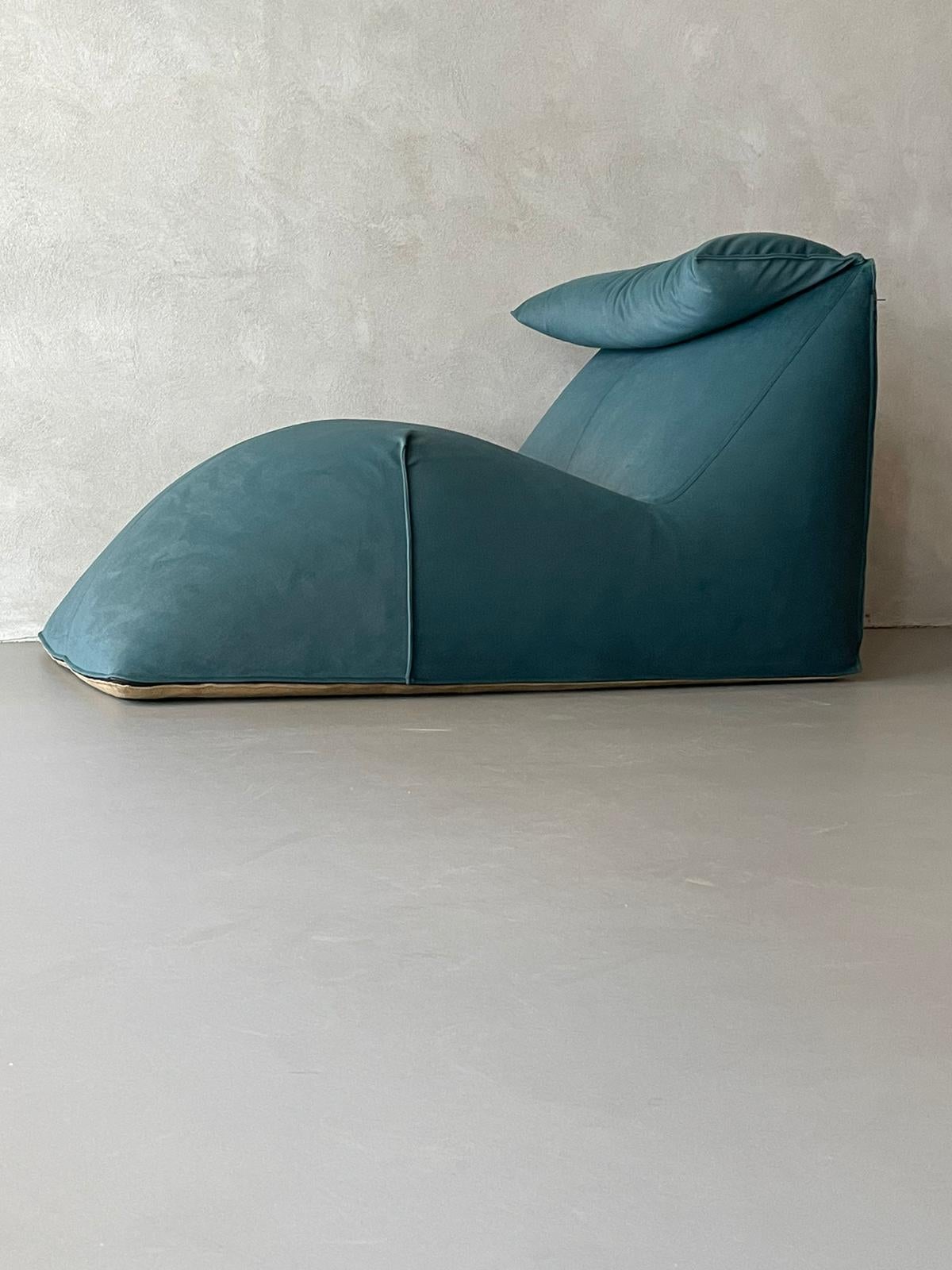 Manufactured by B&B Italy, 1979.
Steel tubular internal frame, shaped polyurethane padding, new upholstering in petrol green fabric

Le Bambole, are icons of the 70s. What makes them special is the apparent absence of a supporting structure, the