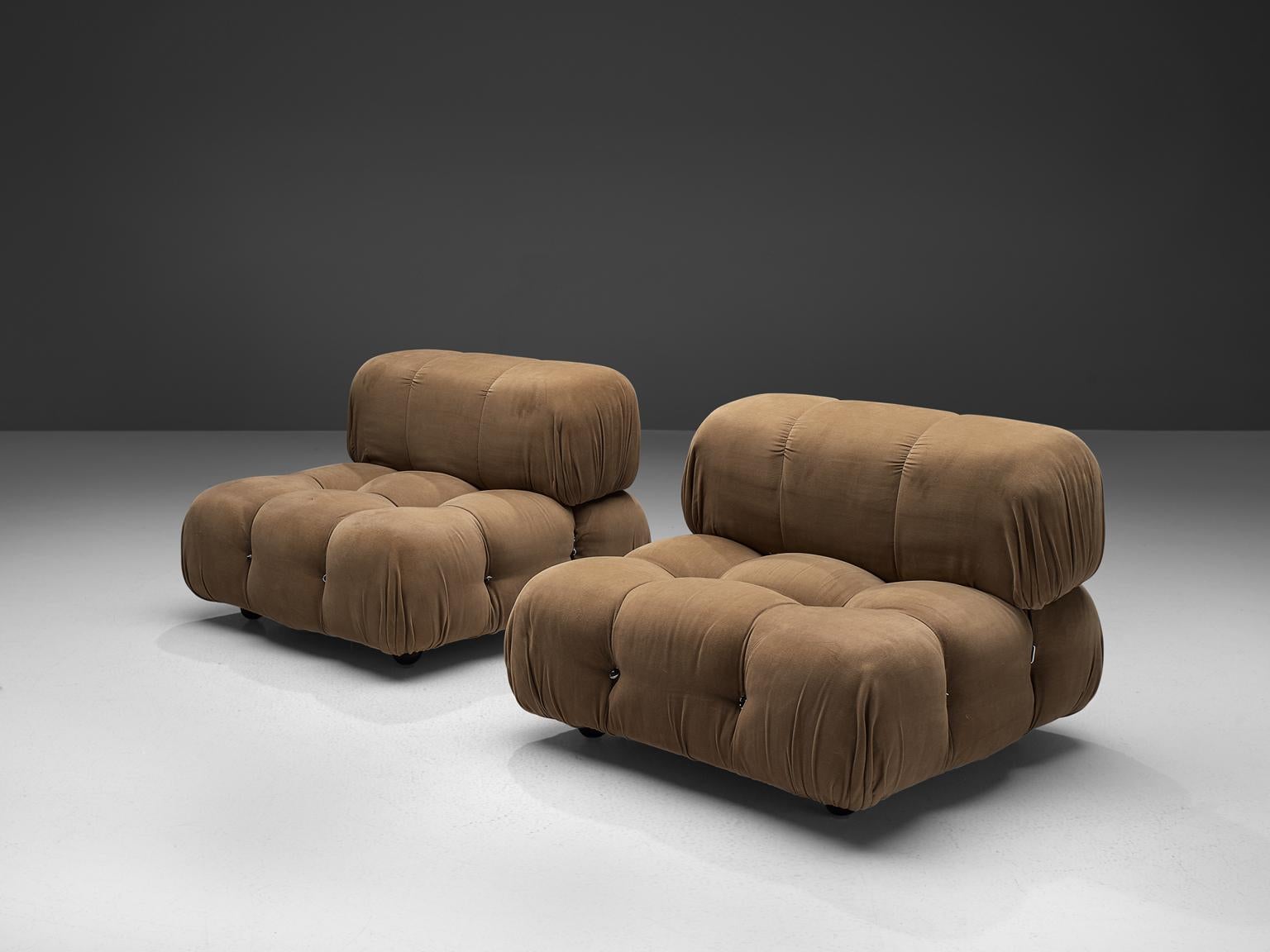 Mario Bellini, modular 'Cameleonda' sofa in beige fabric, Italy, 1972.

The sectional elements of this can be used freely and apart from one another. The backs and armrests are provided with rings and carabiners, which allows the user to create a